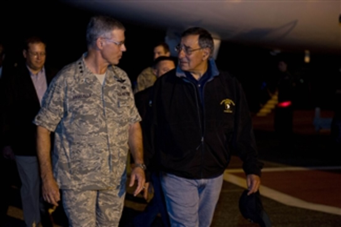 Secretary of Defense Leon E. Panetta, right, walks with U.S. Forces Japan Commander Lt. Gen. Salvatore A. Angelella, U.S. Air Force, after arriving in Tokyo, Japan, on Sept. 16, 2012.  Panetta will visit with defense counterparts in Tokyo before traveling to Beijing, China and Auckland, New Zealand on a weeklong trip to the Pacific. 