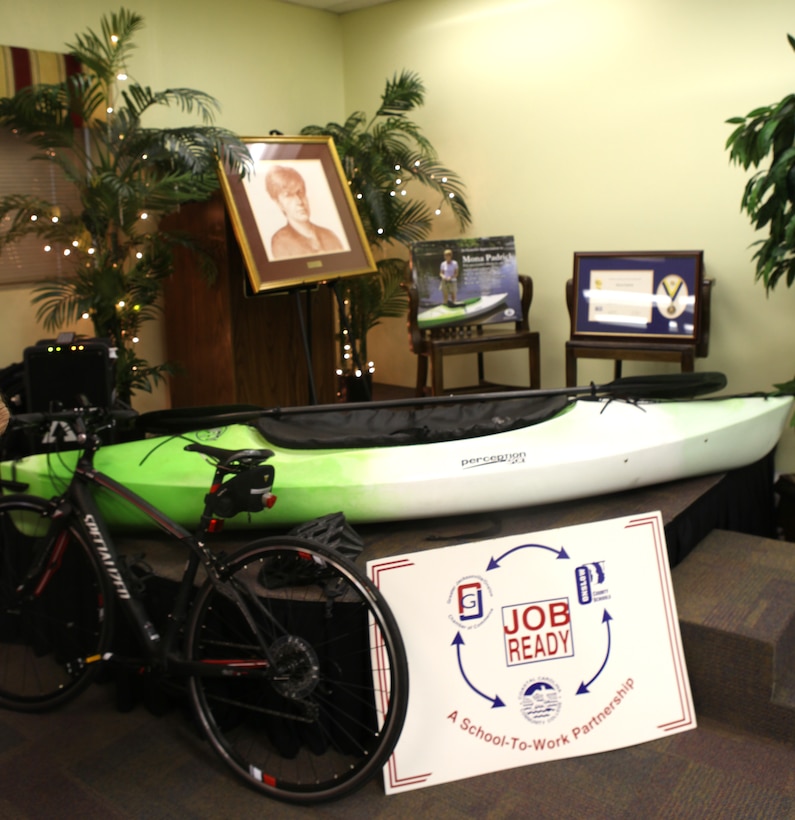 A celebration of Mona Padrick's retirement was held at the Onslow County of Commerce in Jacksonville, N.C. Sept. 12. Equipment from her various hobbies and objects highlighting different aspects of her career were displayed there during the celebration. 