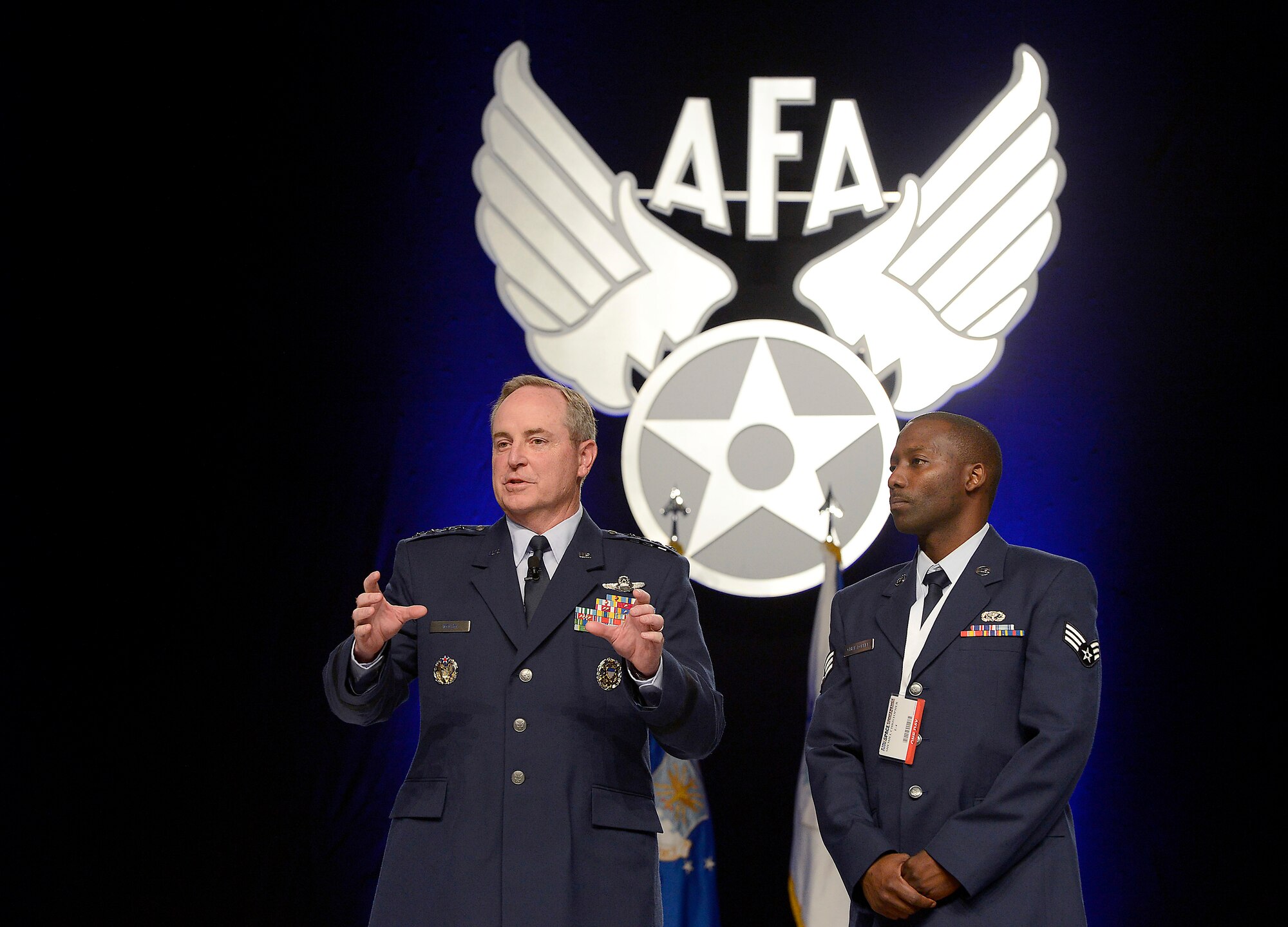 Air Force Chief of Staff Gen. Mark A. Welsh III introduces Senior Airman Shemiel Christopher for his work at the Dover Air Force Base, Del., Fisher House during his keynote presentation on the state of the Air Force at the Air Force Association's Air and Space Conference and Technology Exposition in Washington, D.C., Sept. 18, 2012.   (U.S. Air Force photo/Scott M. Ash)