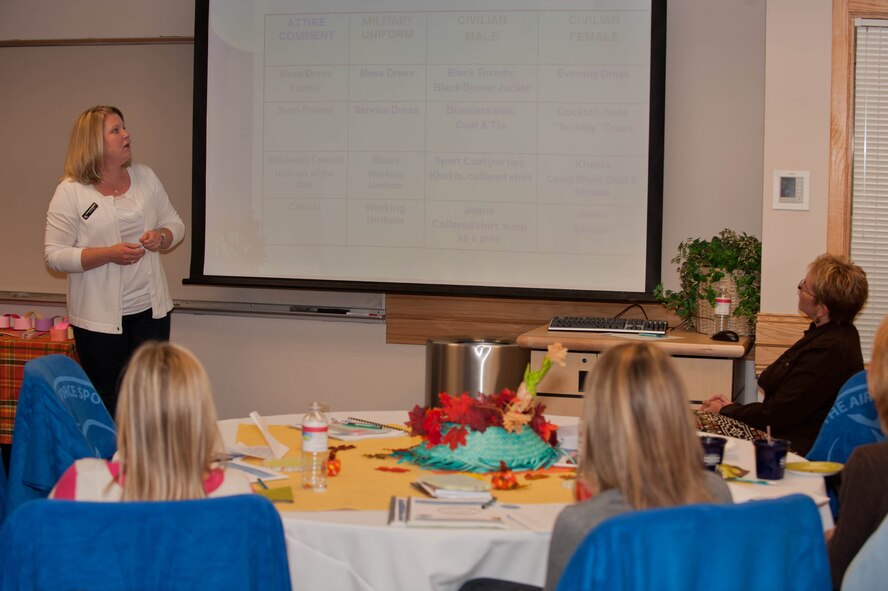 Stephanie Weatherington, wife of Col. Mark Weatherington, 28th Bomb Wing commander, gives a presentation to new spouses during a Heart Link orientation briefing at Ellsworth Air Force Base, S.D., Sept. 17, 2012. Heart Link provides information on various topics ranging from customs and courtesies, demystifying  a leave and earnings statements and introduces many of the support agencies available on base. (U.S. Air Force photo by Airman 1st Class Zachary Hada/Released)