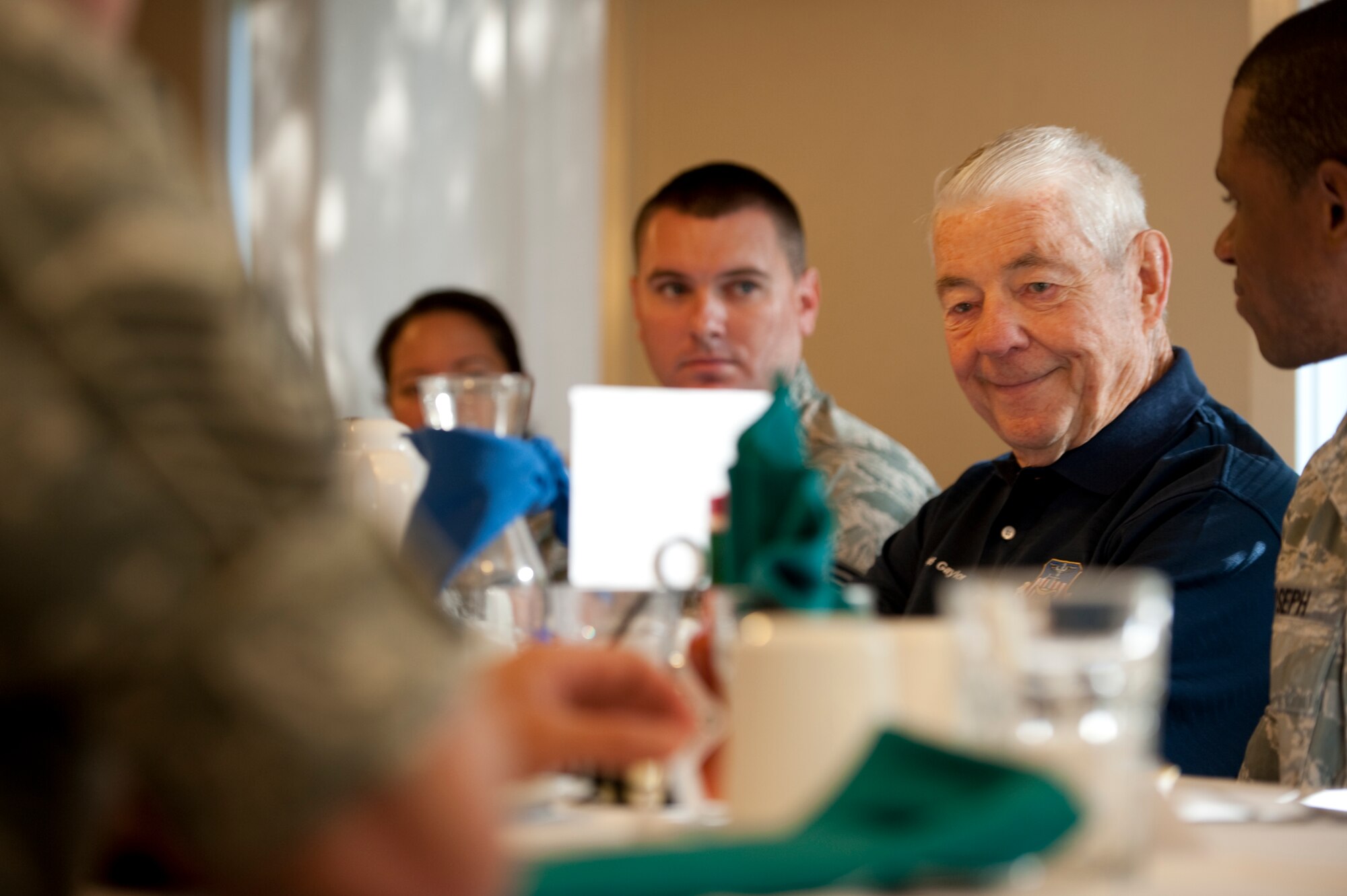 U.S. Air Force Chief Master Sergeant of the Air Force Robert D. Gaylor, the fifth chief to serve as the Air Force’s top enlisted Airman, listens to an Airman’s question inside the Reef dining facility on Hurlburt Field, Fla., Sept. 14, 2012.  Gaylor said it is important to never become complacent in one’s job. (U.S. Air Force Photo/Airman 1st Class Naomi M. Griego)