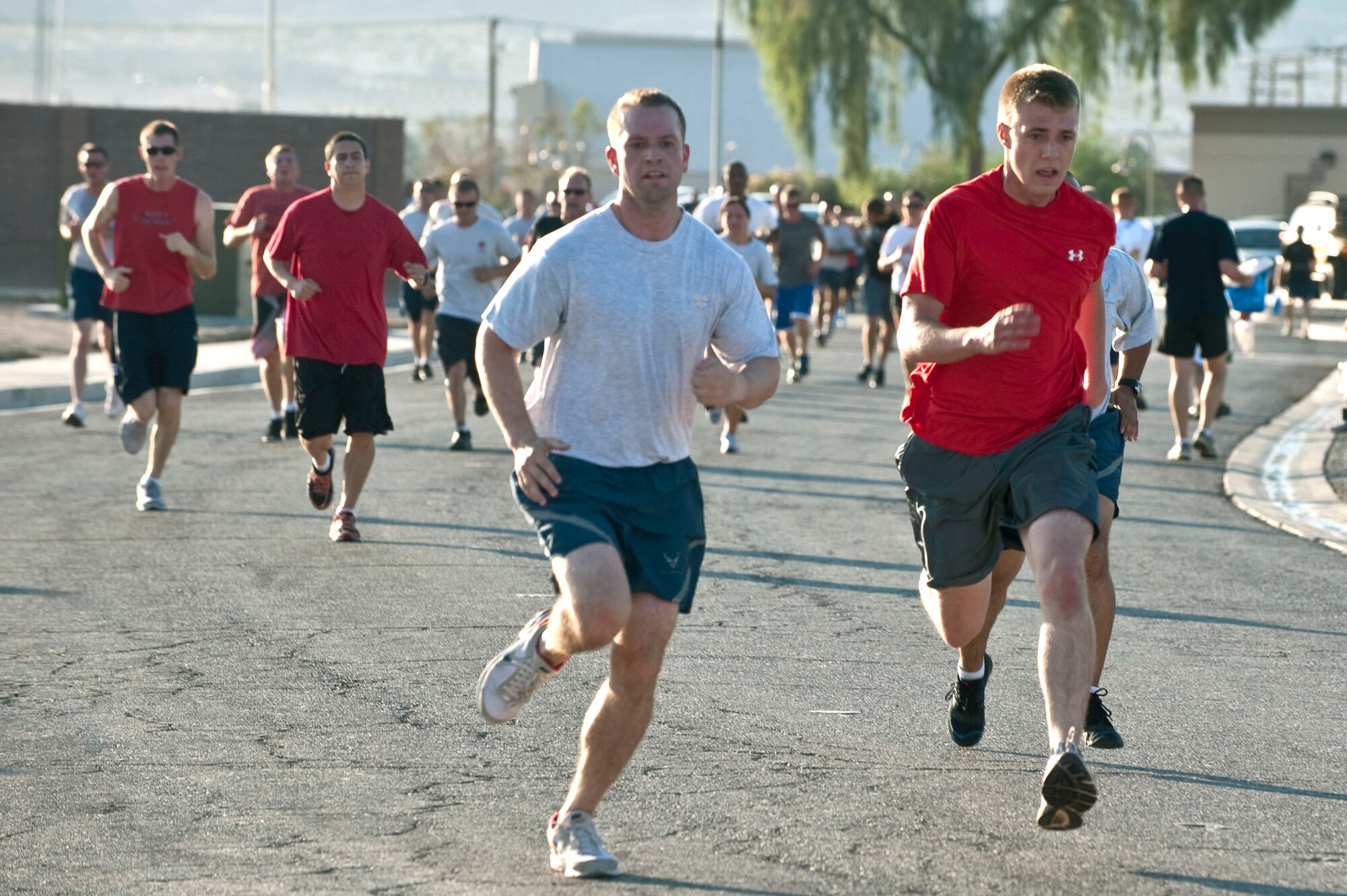 Runners near the finish line during the  United States Air Force five-kilometer birthday run at the Warrior Fitness Center Sept. 18, 2012, at Nellis Air Force Base, Nev. (U.S. Air Force photo by Staff Sgt. Christopher Hubenthal)