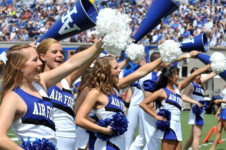 Cheerleaders showcase their Air Force spirit during the Academy’s win against Idaho State Sept. 1, 2012. Academy cheerleaders practice two hours every day to develop chants, stunts and routines for every football and basketball game. (U.S. Air Force photo/Liz Copan)