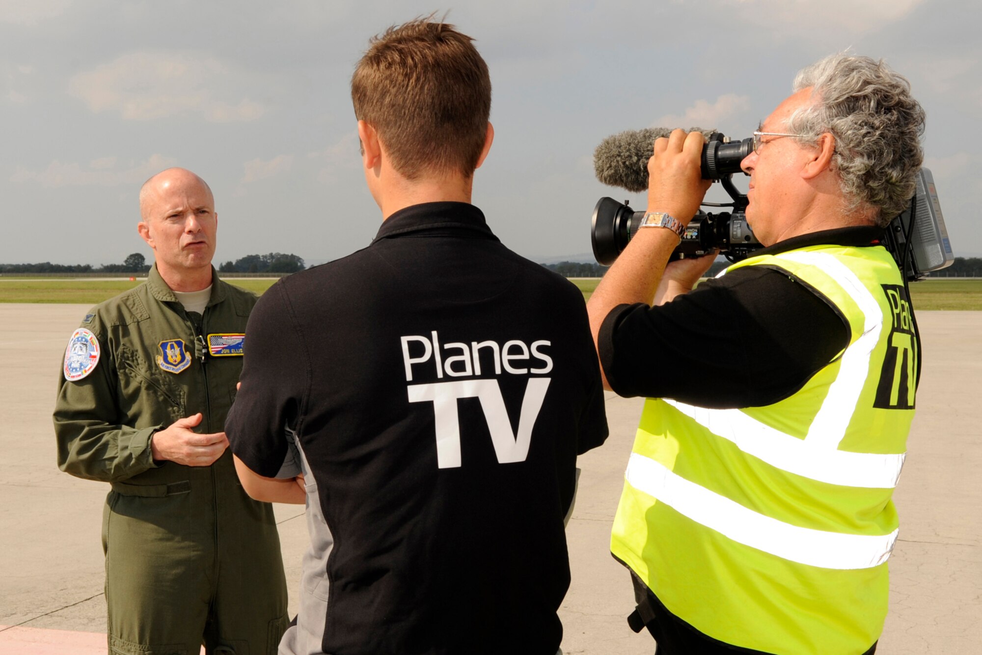 Col. Jonathan Ellis, who is the 307th Bomb Wing commander, is interviewed by Planes TV reporters upon arrival in Ostrava, Czech Republic, Sept. 18, 2012. Two B-52 Stratofortresses from Barksdale Air Force Base, La., are in Ostrava for the annual NATO Days Air Show scheduled for Sept 22-23. This is the third year for the 307 BW to support this air show. (U.S. Air Force photo by Senior Master Sgt Jessica Daurizio/Released)
