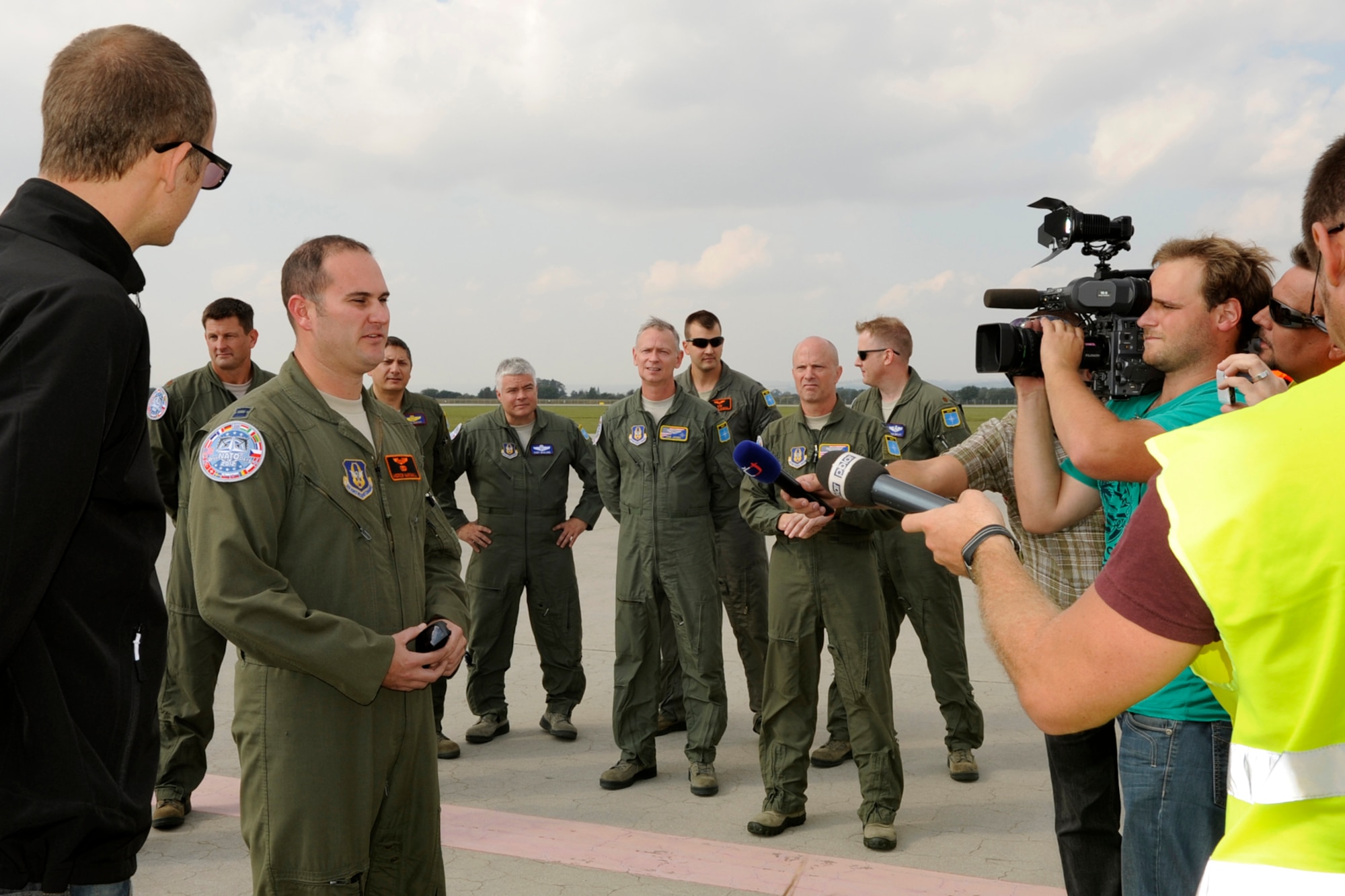 Capt Andrew Marshall, 343rd Bomb Squadron expresses his excitement about being in the Czech Republic upon arrival their Sept. 18, 2012. Two B-52 Stratofortresses from Barksdale Air Force Base, La., are in Ostrava for the annual NATO Days Air Show scheduled for Sept 22-23. This is the third year for the 307th Bomb Wing to support this air show. (U.S. Air Force photo by Senior Master Sgt Jessica Daurizio/Released)