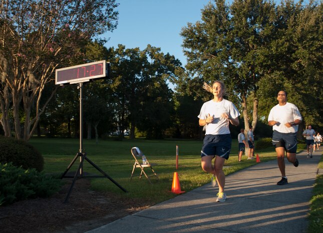 1st Lt. Anne Marie Kemp, 14th Airlift Squadron, 437th Airlift Wing, finishes as the fastest female runner with a time of 17:27 during the 2.37-mile 100th Commander's Challenge Run at Joint Base Charleston - Air Base, Sept. 14, 2012. (U.S. Air Force photo/Airman 1st Class Ashlee Galloway)