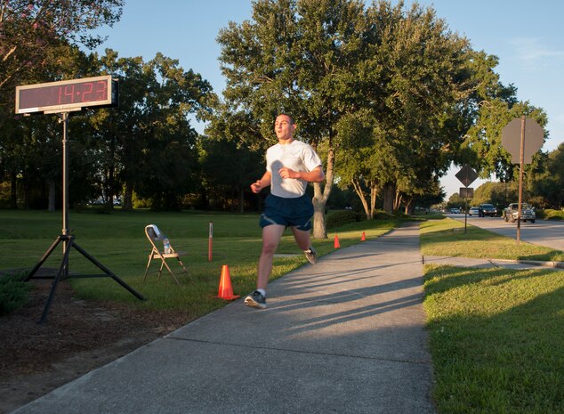 Airman Basic Steven Gray, 373rd Training Squadron Det. 5, was the fastest male runner with a time of 14:23 during the 2.37-mile 100th Commander's Challenge Run at Joint Base Charleston - Air Base, Sept. 14, 2012. (U.S. Air Force photo/Airman 1st Class Ashlee Galloway)
