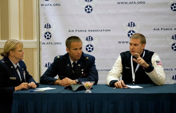 From right: U.S. Air Force Capt. Seth Kelsey speaks while Maj. (Dr.) James Bales and Capt. Shannon Stoneking, the moderator, listen as they take part in the Air Force World Class Athlete Bloggers' Roundtable during the Air Force Symposium in Washington, Sept. 17, 2012. Kelsey is assigned to the 310th Force Support Squadron, Buckley Air Force Base, Colo., and Bales is with the 21st FSS, Peterson AFB, Colorado. (U.S. Air Force photo by Val Gempis)