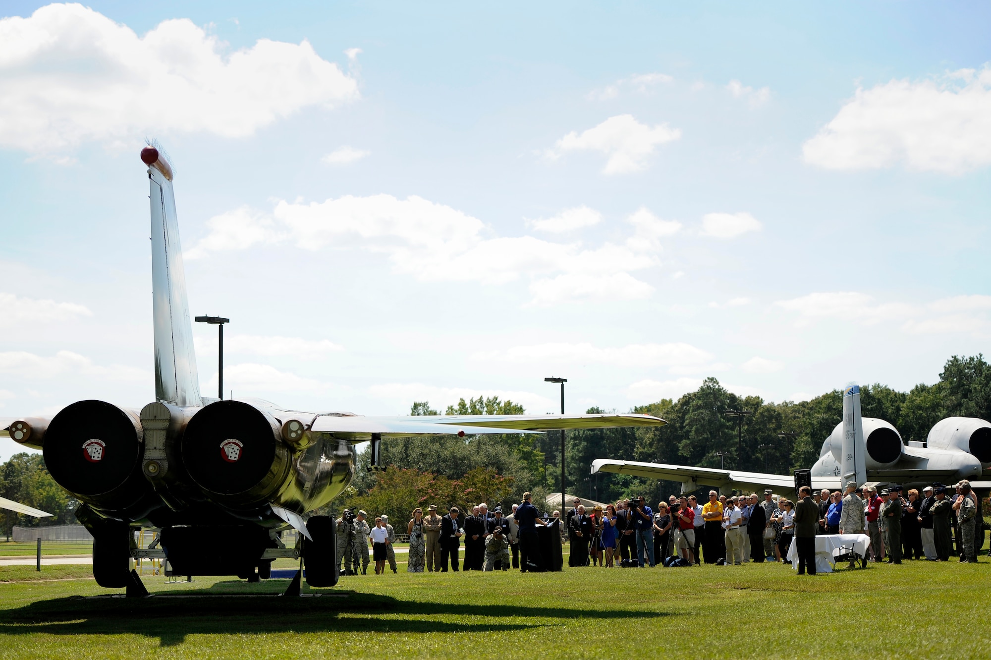 U.S. Air Force Airmen and guests gather around the F-111E Aardvark for a dedication ceremony, Sept. 12, 2012, Shaw Air Force Base, S.C. The F-111E is a significant part of the 20th Fighter Wing’s history as it was first flown as a part of the wings arsenal in 1970. Aircraft 68-0035 and 680045 landed at Royal Air Force Upper Heyford 42 years ago, starting a new era for the wing. (U.S. Air Force photo by Senior Airman Kenny Holston/Released)  