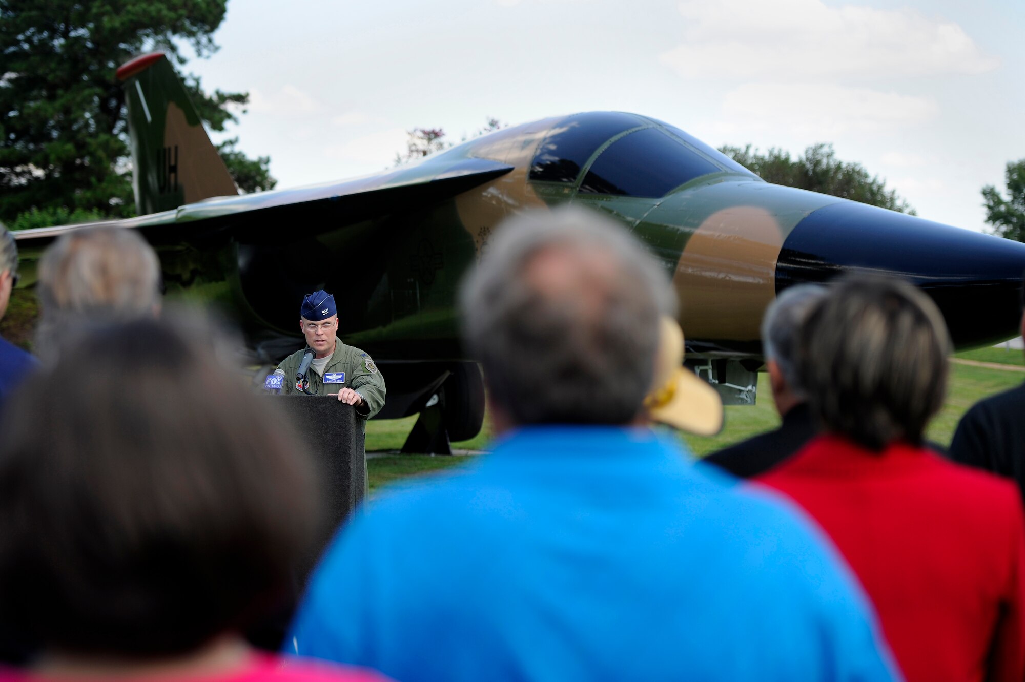 U.S. Air Force Col. Lance Kildron, 20th Fighter Wing vice commander (center) welcomes Airmen and guests to the F-111E Aardvark dedication ceremony, Sept. 12, 2012, Shaw Air Force Base, S.C. The F-111E is a significant part of the 20th Fighter Wing’s history as it was first flown as a part of the wings arsenal in 1970. Aircraft 68-0035 and 680045 landed at Royal Air Force Upper Heyford 42 years ago, starting a new era for the wing. (U.S. Air Force photo by Senior Airman Kenny Holston/Released) 