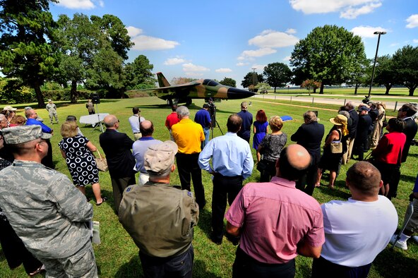 U.S. Air Force Col. Lance Kildron, 20th Fighter Wing vice commander (center) welcomes Airmen and guests to the F-111E Aardvark dedication ceremony, Sept. 12, 2012, Shaw Air Force Base, S.C. The F-111E is a significant part of the 20th Fighter Wing’s history as it was first flown as a part of the wings arsenal in 1970. Aircraft 68-0035 and 680045 landed at Royal Air Force Upper Heyford 42 years ago, starting a new era for the wing. (U.S. Air Force photo by Senior Airman Kenny Holston/Released) 