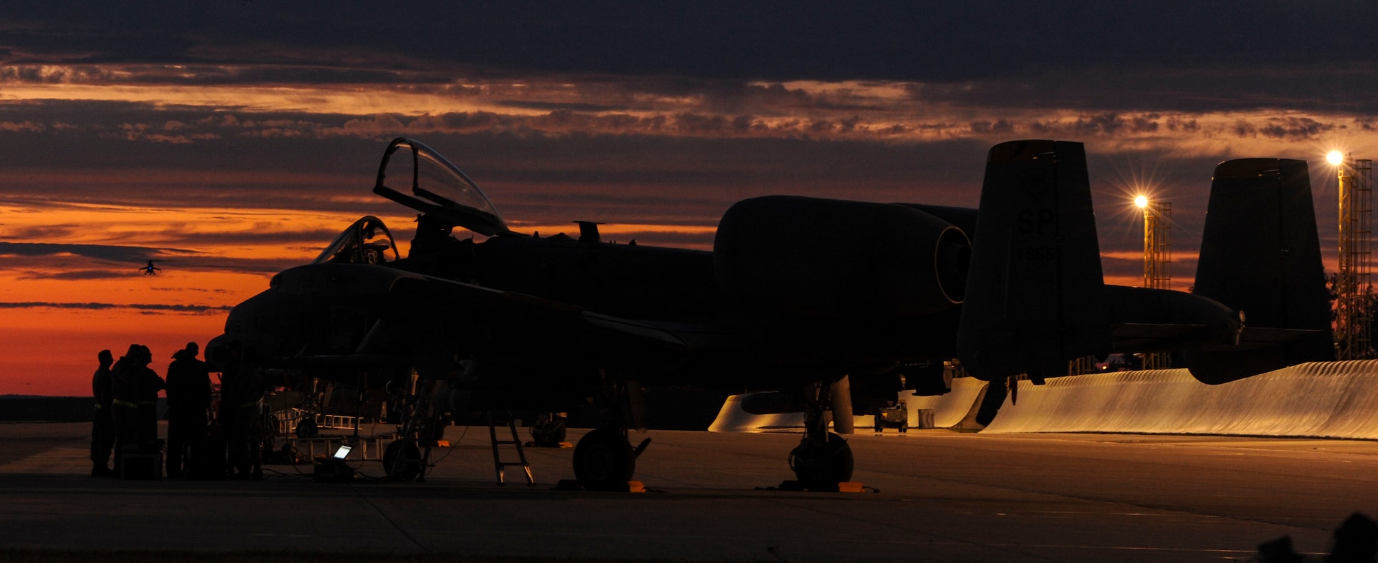 NAMEST AIR BASE, Czech Republic -- Members of the 81st Aircraft Maintenance Unit discuss repairs for an A-10 Thunderbolt II from the 81st Fighter Squadron Sept. 14 during Ramstein Rover 2012 here. RARO 12 is a NATO exercise focused on preparing forward air controllers for contingency operations. Sixteen NATO member nations are participating in the exercise to establish and build upon common techniques, tactics and practices. (U.S. Air Force photo by Senior Airman Natasha Stannard/ Released)