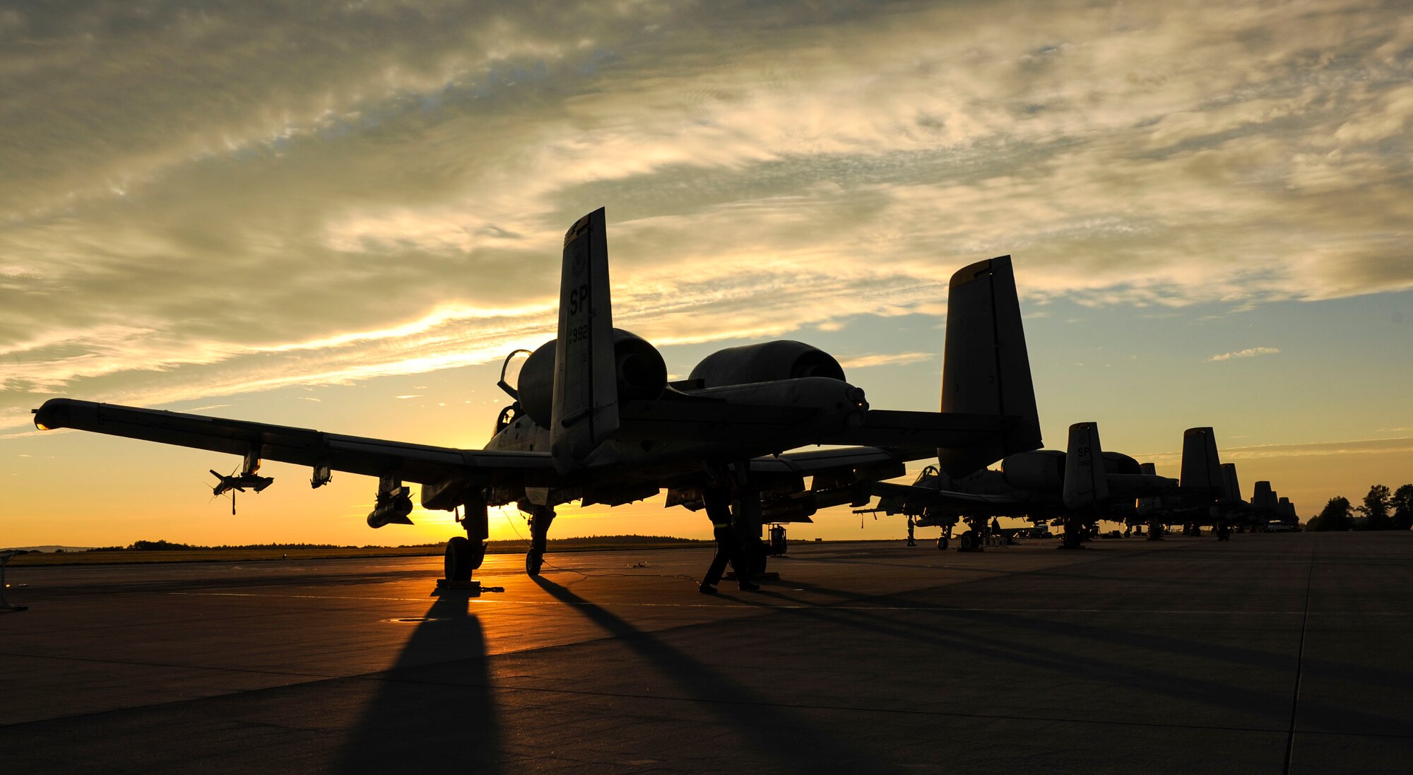 NAMEST AIR BASE, Czech Republic -- A-10 Thunderbolt II pilots from the 81st Fighter Squadron check their aircraft systems before flight Sept. 14 during Ramstein Rover 2012 here. RARO 12 is a NATO exercise focused on preparing forward air controllers for contingency operations. Sixteen NATO member nations are participating in the exercise to establish and build upon common techniques, tactics and practices. (U.S. Air Force photo by Senior Airman Natasha Stannard/ Released)