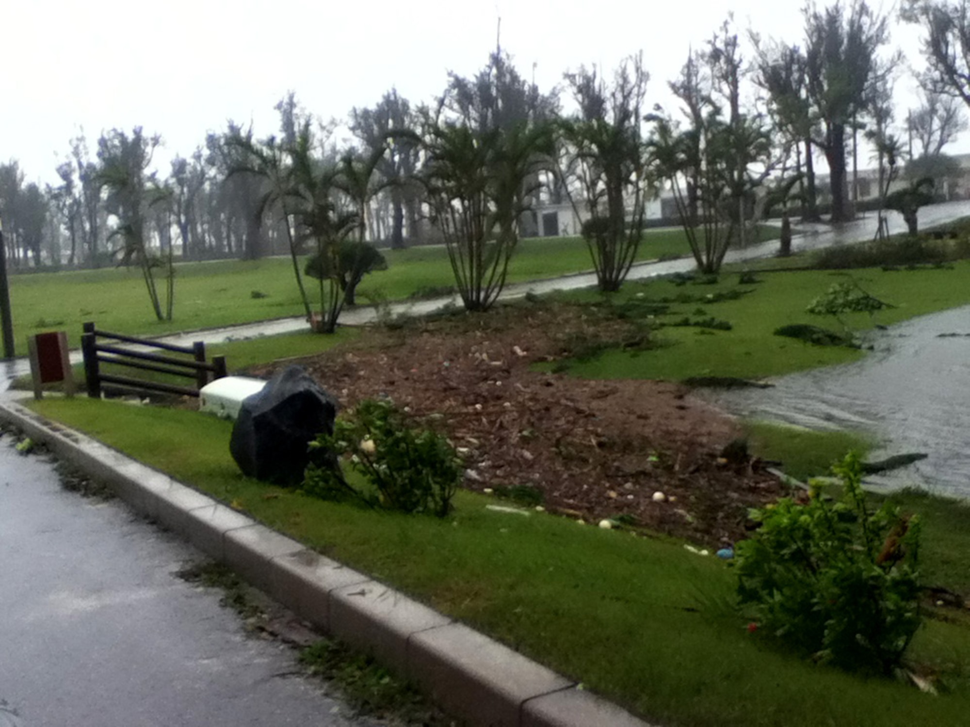 High tide, rain and debris clog the drainage systems throughout the Okuma Recreational Facility and Kadena Air Base, after Typhoon Sanba hit Okinawa, Japan, Sept. 16, 2012. Flooding and trees blown onto lodging caused leadership to close the Okuma facility while Okuma staff and 18th Civil Engineer Squadron members work to reopen the facility by Sept. 20, 2012. Damage to military installations on-island is estimated at $240,000, and claims are still being tallied by 18th CES members. (Courtesy photo)
