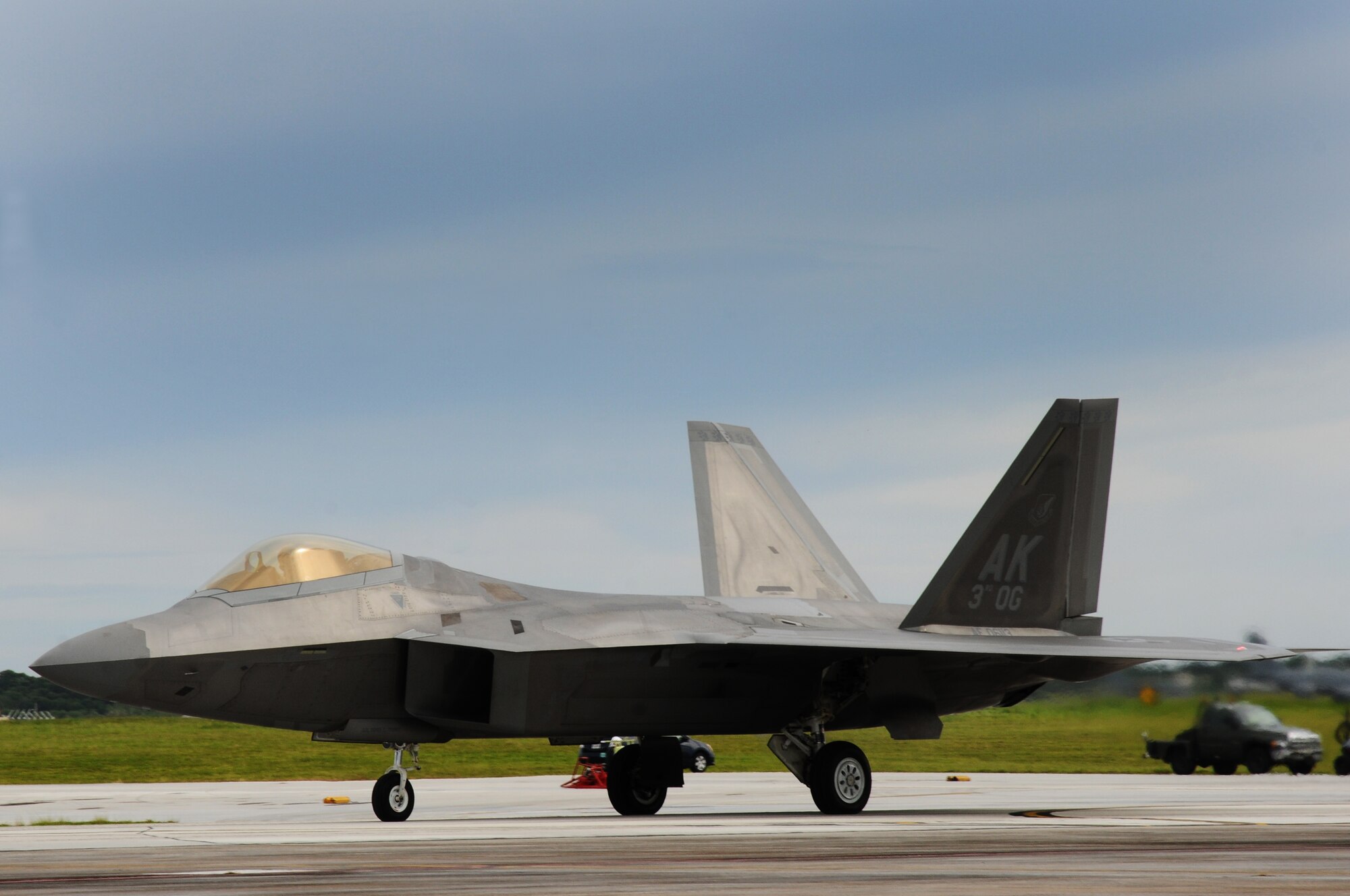 ANDERSEN AIR FORCE BASE, Guam – An F-22 Raptor from the 90th Fighter Squadron, 3rd Wing, Joint Base Elmendorf-Richardson taxis, Sept. 17. The F-22 is deployed to Andersen as part of the Theater Security Package and will be participating in various air training scenarios while on Guam. (U.S. Air Force photo by Senior Airman Carlin Leslie/Released)
