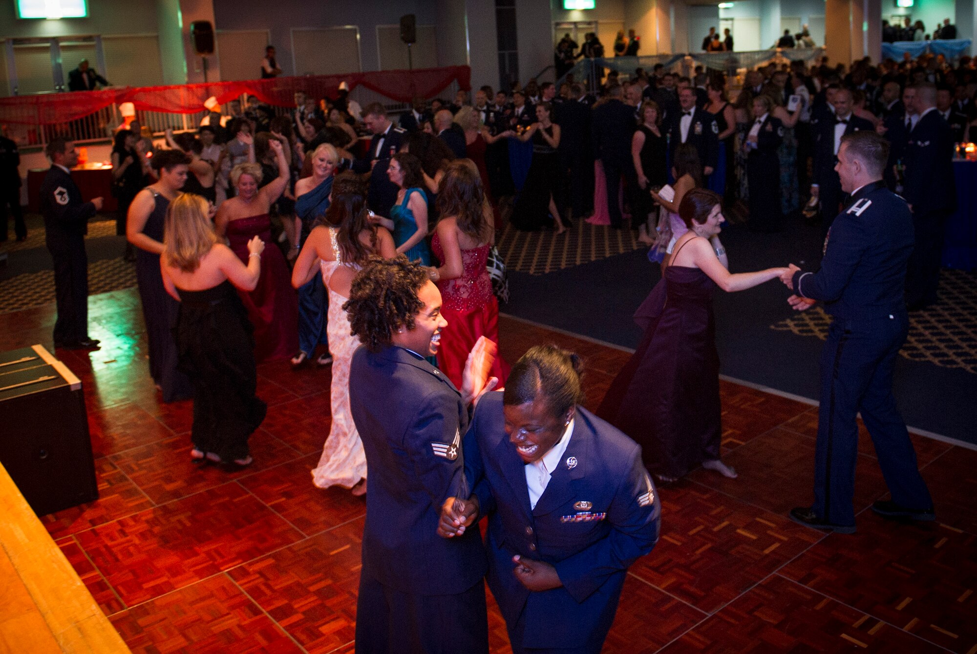 YOKOTA AIR BASE, Japan -- Yokota members dance and mingle during the Air Force ball at Yokota Air Base, Japan, Sept. 15, 2012. This year's ball marked the 65th anniversary of the Air Force and commemorated its heritage. (U.S. Air Force photo by Senior Airman Andrea Salazar)