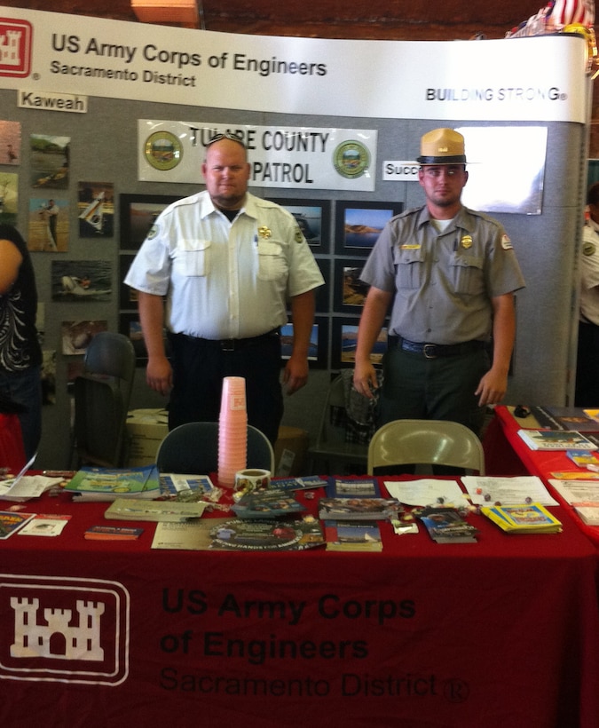 U.S. Army Corps of Engineers park rangers from Lake Kaweah and Success Lake partnered with Tulare County Lake Patrol to participate in the 94th annual Tulare County Fair.  Thousands attended the fair and were educated on water safety, flood reduction, state and federal regulations and the impact on local communities. From left are County Officer Tommy Crosswy and Park Ranger Chad Kilgore.

