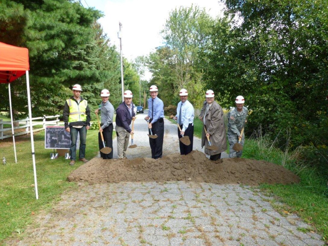 Breaking ground to mark the start of construction for Hobart's Ash Street drainage improvement project are, from left, Jonathan Vanerka, Olthoff Inc., Chicago Heights, Ill.; Jake Dammarell, Butler Fairman & Seufert, Indianapolis, Ind.; Tim Kingsland, Hobart Sanitary District; Rep. Peter Visclosky; Hobart Mayor Brian Snedecor; Bob Fulton, Hobart Sanitary District; and District Engineer Col. Frederic Drummond Jr.