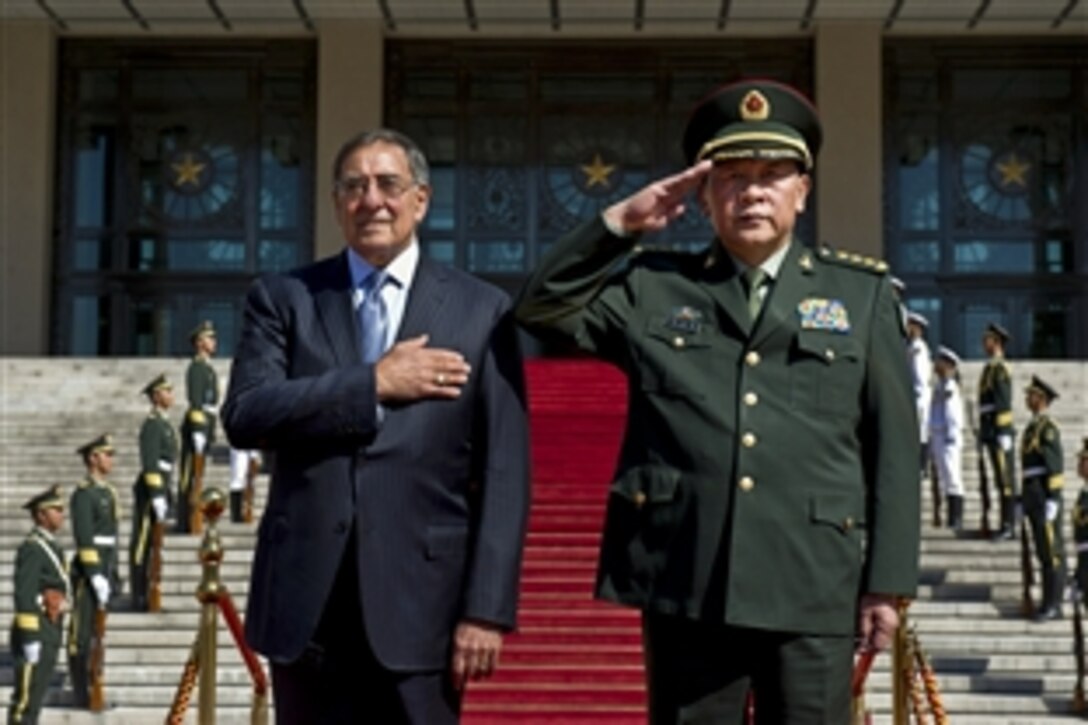 U.S. Defense Secretary Leon E. Panetta and Chinese Defense Minister Gen. Liang Guanglie participate in an honors ceremony in Beijing, Sept. 18, 2012. Panetta visited Tokyo before  Beijing, and will travel to Auckland, New Zealand, during a weeklong trip to the Asia-Pacific region.