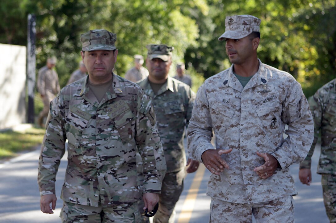 Rear Adm. Marco Amigo Jimenez, general commandant of the Chilean Marine Corps, tours the Special Operations Training Group facilities at Stone Bay during his day-long visit to Marine Corps Base Camp Lejeune Sept. 13. The visit, attended in conjunction with staff from Marine Corps Forces Southern Command who helped facilitate the trip, was to showcase the Marine Corps' urban training environments.