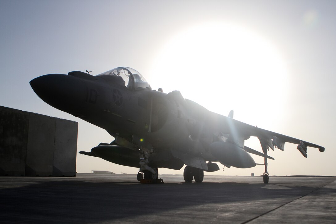 An AV-8B Harrier II Plus with Marine Attack Squadron 211, 3rd Marine Aircraft Wing (Forward), awaits its next mission on the tarmac at Camp Bastion, Afghanistan, Sept. 18, 2012. The aircraft provides air support to the ground units throughout Helmand and Nimroz provinces. Despite a roller coaster week for the squadron, VMA-211 remains fully operational and continues to provide support to ground troops throughout Regional Command Southwest?s area of operations.