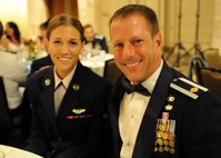 Maj. Jeffrey Holley, Pacific Air Forces A7K chief of strategic integration, and his daughter Airman 1st Class Samantha Holley, a C-17 loadmaster with the 535th Airlift Squadron, pose for a photo during the Joint Base Pearl Harbor-Hickam 65th Air Force Ball, held at the Hilton Hawaiian Village Sept. 14, 2012.  Maj. Holley invited his daughter as his date to the ball shortly after discovering that he would be stationed at JBPH-H, Hawaii with her. (U.S. Air Force photo/Tech. Sgt. Jerome S. Tayborn)