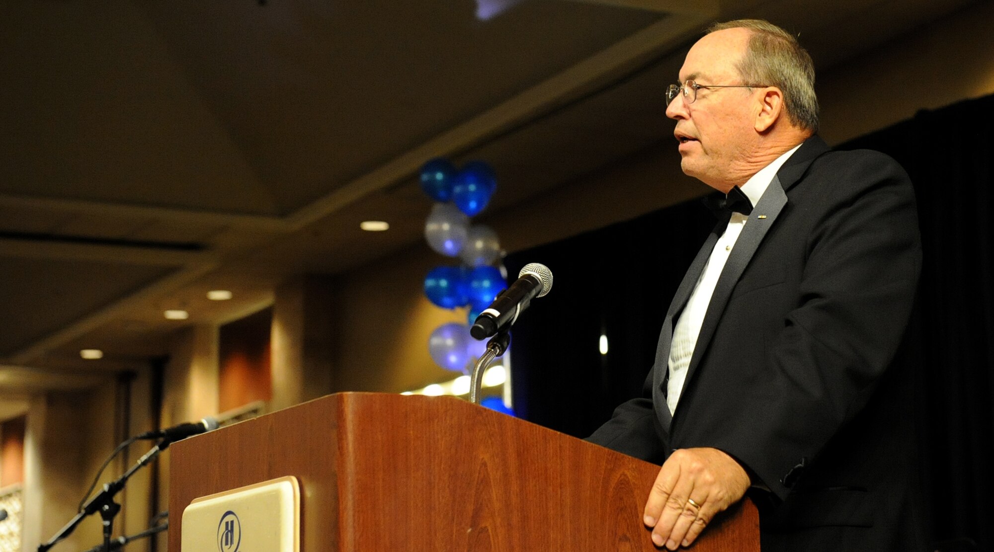 Lt. Gen. David Deptula, retired, former deputy chief of staff for Intelligence, Surveillance, and Reconnaissance, speaks to attendees during the Joint Base Pearl Harbor-Hickam Air Force Ball, at the Hilton Hawaiian Village Sept. 14, 2012. More than 1,300 JBPH-H members came together to celebrate the Air Force's 65th anniversary. This year’s theme was, “Say ‘Thank You’ to an Airman,” honoring the courage and service of Airmen throughout the decades.  (U.S. Air Force photo/Tech. Sgt. Jerome S. Tayborn) 