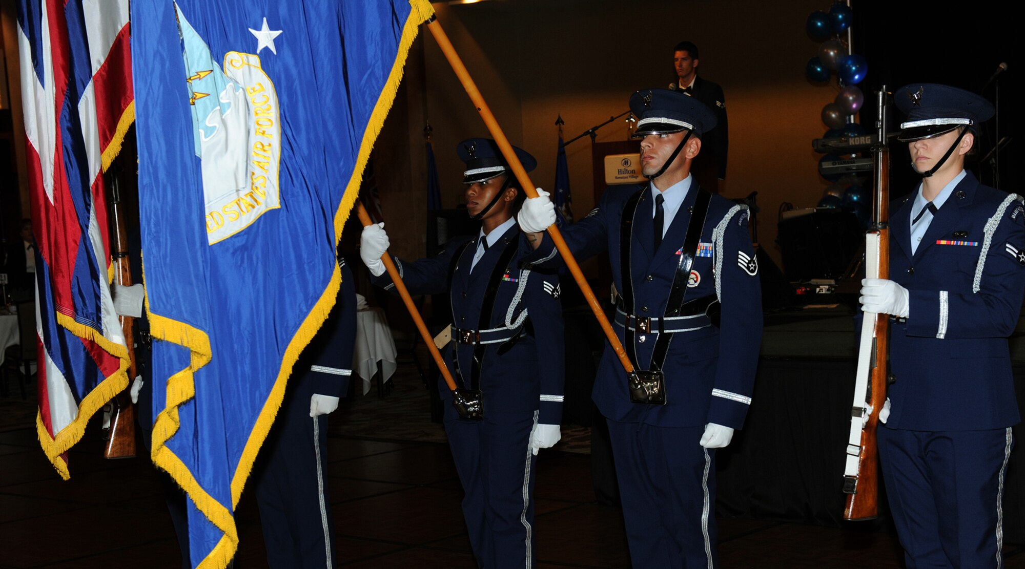 The Team Hickam Honor Guard presents the colors at the Joint Base Pearl Harbor-Hickam 65th Air Force Ball, held at the Hilton Hawaiian Village Sept. 14, 2012. This year’s theme was, “Say ‘Thank You’ to an Airman.” The theme was chosen to honor the courage and service of Airmen throughout the decades. (U.S. Air Force photo/Tech. Sgt. Jerome S. Tayborn)