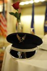 A missing-man table is present at the Air Force Ball. The table represents the lost and fallen service members who were honored, although absent, because they are still missing in action. This year’s Joint Base Pearl Harbor-Hickam Air Force Ball’s theme was “Say ‘Thank You’ to an Airman.” The theme was chosen to honor the courage and service of Airmen throughout the decades.  (U.S. Air Force photo/Tech. Sgt. Jerome S. Tayborn)