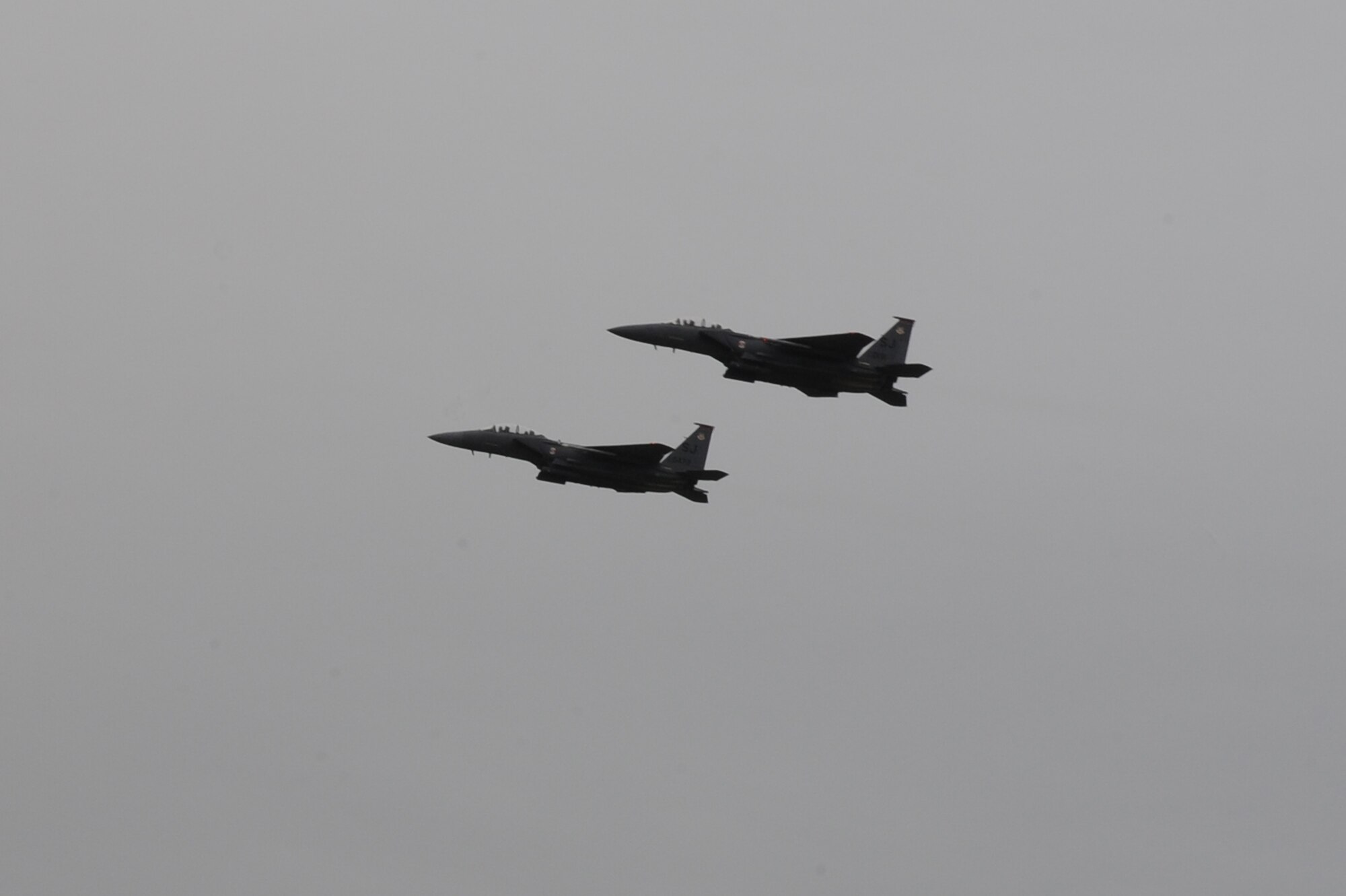 Two F-15E Strike Eagles fly side by side overhead during Phase II of Operational Readiness Exercise Coronet Warrior 12-04 at a simulated deployed location on Seymour Johnson Air Force Base, N.C., Sept. 19, 2012. During the exercise, the F-15Es simulated a deployed mission of eliminating all enemy threats on the ground and in the air as well as protecting the base. (U.S. Air Force photo/Airman 1st Class John Nieves Camacho/Released)