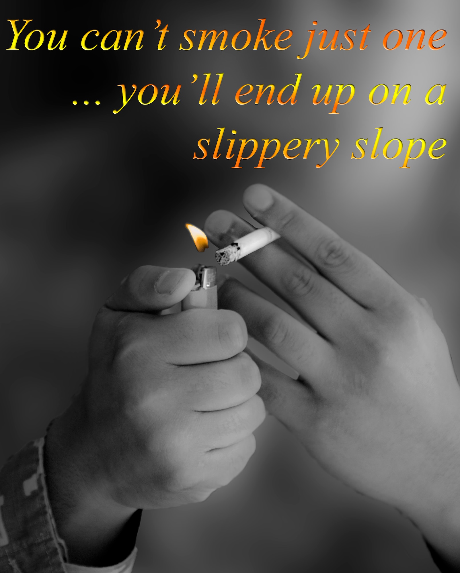 A smoker lights one cigarette despite a quote mentioning how smoking just one can be a slippery slope. Department of Defense card holding smokers wishing to quit tobacco can attend the Tobacco Cessation class offered at the Health and Wellness Center or call the American Lung Association Quit Line at 1-877-695-7848. (U.S. Air Force photo illustration by Senior Airman Jack Sanders)
