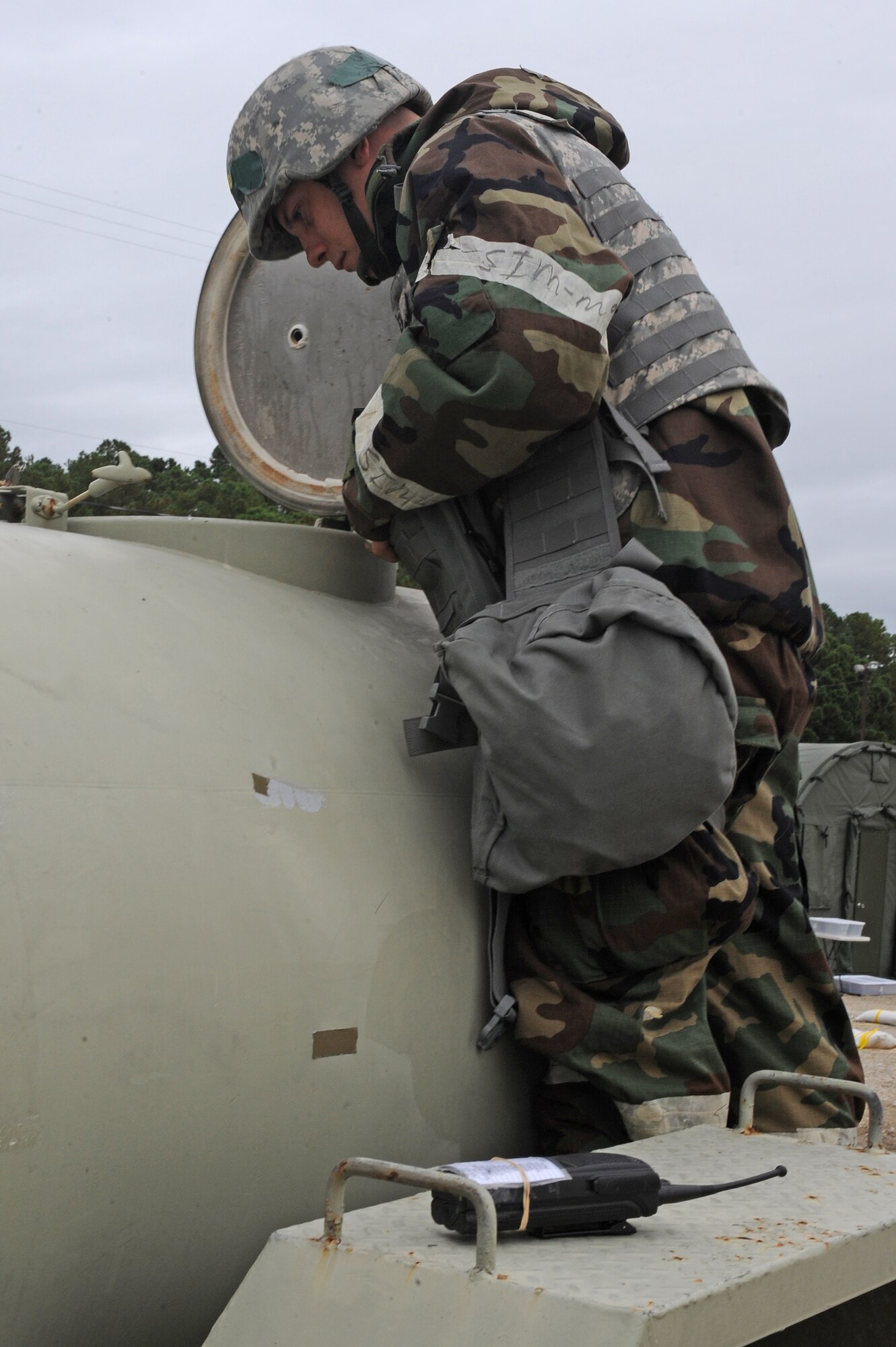 U.S. Air Force Senior Airman Shane O'Neill, 4th Civil Engineer Squadron water and fuel systems maintenance journeyman, inspects a water buffalo during Phase II of Operational Readiness Exercise Coronet Warrior 12-04 at a simulated deployed location on Seymour Johnson Air Force Base, N.C., Sept. 19, 2012. A water buffalo stores potable water for the base populace to utilize. (U.S. Air Force photo/Airman 1st Class John Nieves Camacho/Released)