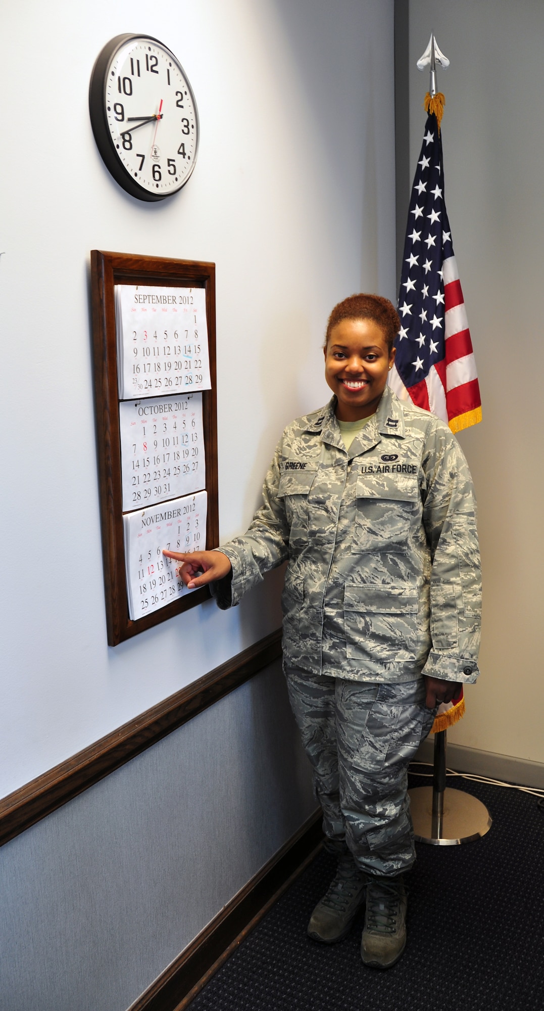Capt. Melissa Z. Greene, 94th Airlift Wing executive officer, points out when Election Day is on her office calendar. Election Day is Nov. 6, less than two months away. (U.S. Air Force photo/Senior Airman Elizabeth Van Patten)