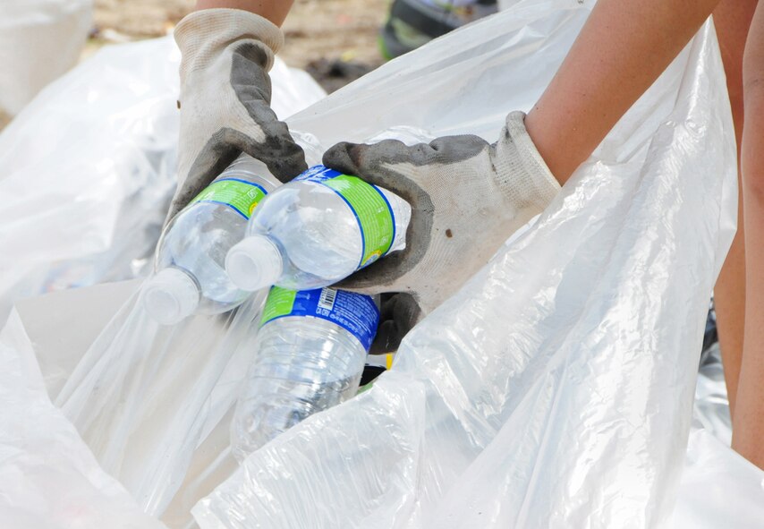 TANGUISSON BEACH, Guam – After collecting the trash, volunteers separated the recycle from refuse during 18th Annual Guam International Coastal Cleanup here, Sept. 15. The cleanup had volunteers from government, military, civilian and private sectors, who worked together to preserve mother nature’s beauty. (U.S. Air Force photo by Airman 1st Class Marianique Santos/Released)