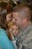 Tech. Sgt. Ron Roe shares an intimate moment with his daughter, Krysta, shortly after arriving back home at Tinker Air Force Base on Monday, Sept. 10, following a six-month deployment to Southwest Asia, while his son, William, looks on. Sergeant Roe was one of approximately 50 Airmen from the 552nd Air Control Wing to have returned from the recent deployment to Al Dhafra Air Base, United Arab Emirates, in support of ongoing operations in Afghanistan. (Air Force photo by Darren D. Heusel)