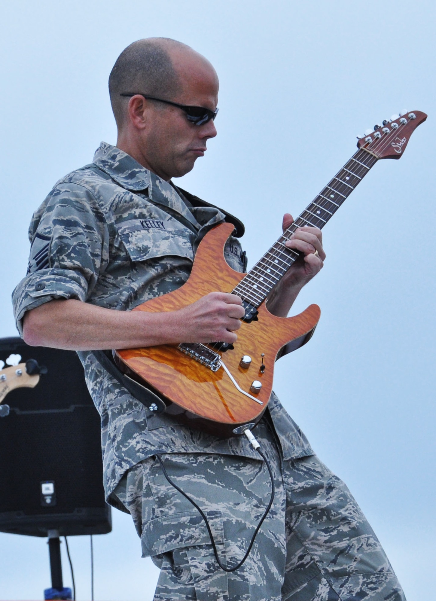 Master Sgt. Steve Kelley, Starlifter NCO in charge, plays the song Foreplay/Long Time by Boston at 2012 Airpower over the Midwest air show Sept. 15, 2012. The Band of Mid-America jazz ensemble, Shade of Blue, also played at the air show as well. (U.S. Air Force photo/Airman 1st Class Jake Eckhardt)