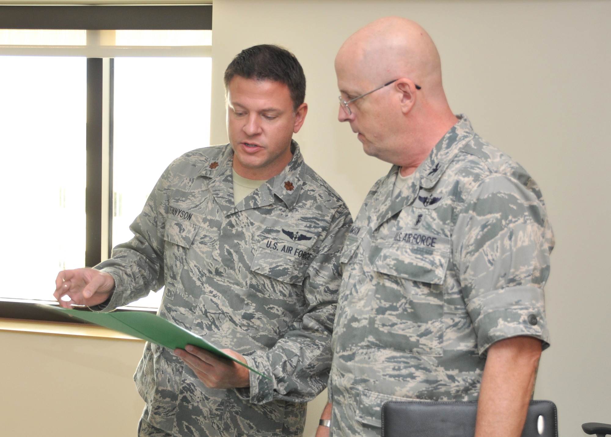 Col. Col. Jerry Lawson, new 81st Inpatient Operations Squadron commander, right, and Maj. William Tennyson, the squadron’s Critical Care Flight commander, discuss changes being requested to ensure the inpatient units in the new Back Bay Tower include state-of-the art patient safety elements, at Keesler Air Force Base, Miss.  Lawson assumed command of the unit from Col. Susan Bassett July 12.  Lawson comes to Keesler AFB from David Grant Medical Center at Travis AFB, Calif., where he was deputy chief nurse.  Bassett left Keesler for Lackland AFB, Texas, where she will be 59th Medical Wing deputy chief nurse. (U.S. Air Force photo by Steve Pivnick)