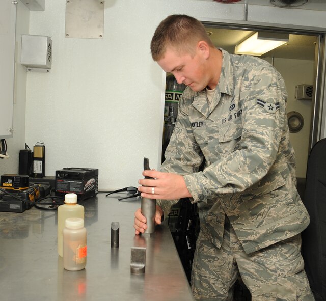 Airman 1st Class T.J. Brantley, 2nd Civil Engineer Squadron Explosive Ordnance Disposal apprentice, assembles an MK-2 disruptor tool on Barksdale Air Force Base, La., Sept. 18. EOD Airmen are responsible for performing, supervising and managing explosive ordnance disposal operations. They are also able to identify, disarm, neutralize, recover and dispose of hazardous explosives. (U.S. Air Force photo/ Senior Airman Sean Martin) (RELEASED)