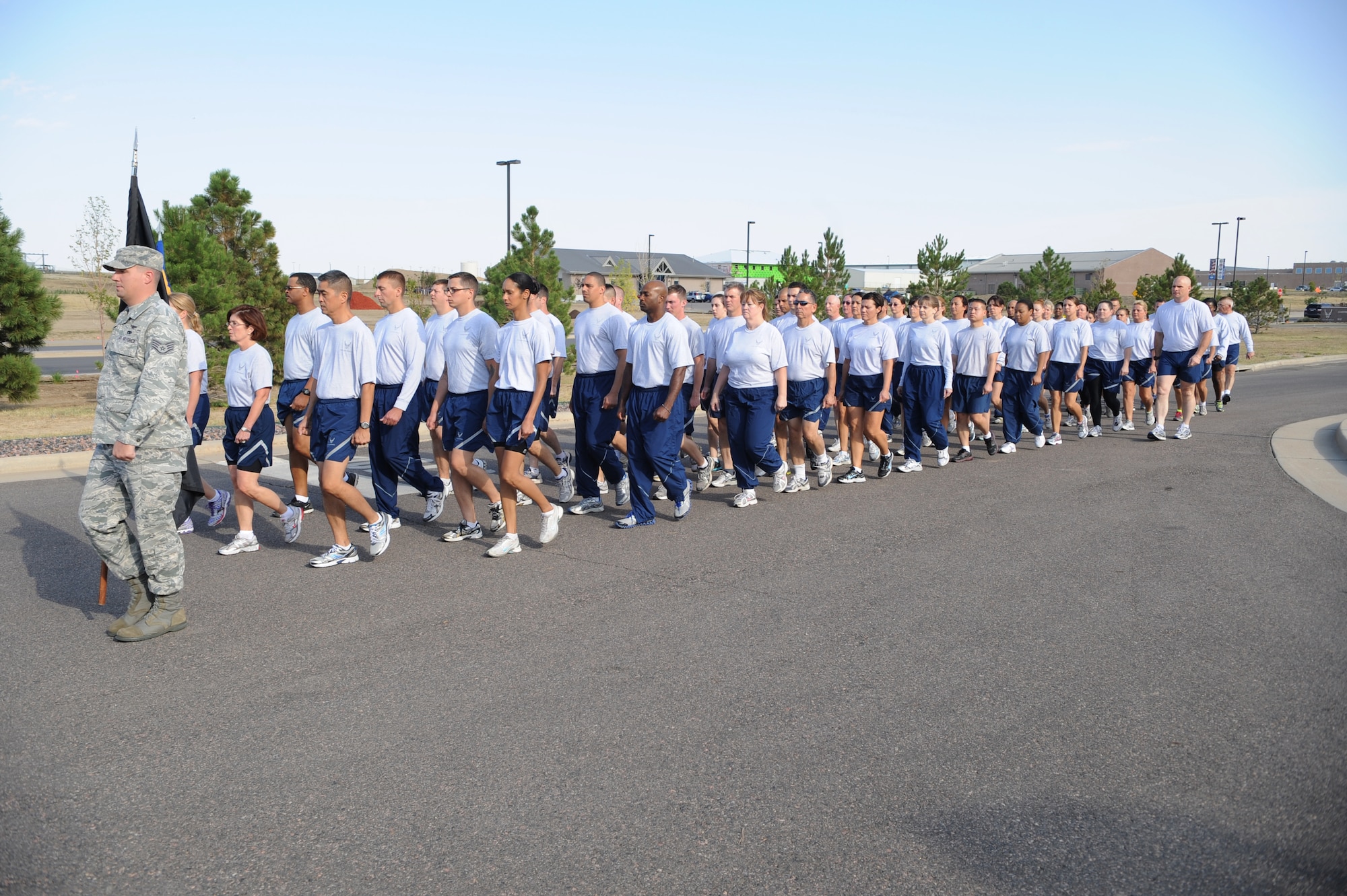 BUCKLEY AIR FORCE BASE, Colo. – A formation of Air Reserve Personnel Center service members conclude the multiservice memorial march in honor of prisoners of war and those missing in action during the base’s observance of National POW/MIA Recognition Day Sept. 17, 2012. The day’s events included a multiservice march, 12-hour wreath guard detail and retreat ceremony to honor those who sacrificed for the nation. (U.S. Air Force photo by Airman 1st Class Phillip Houk)