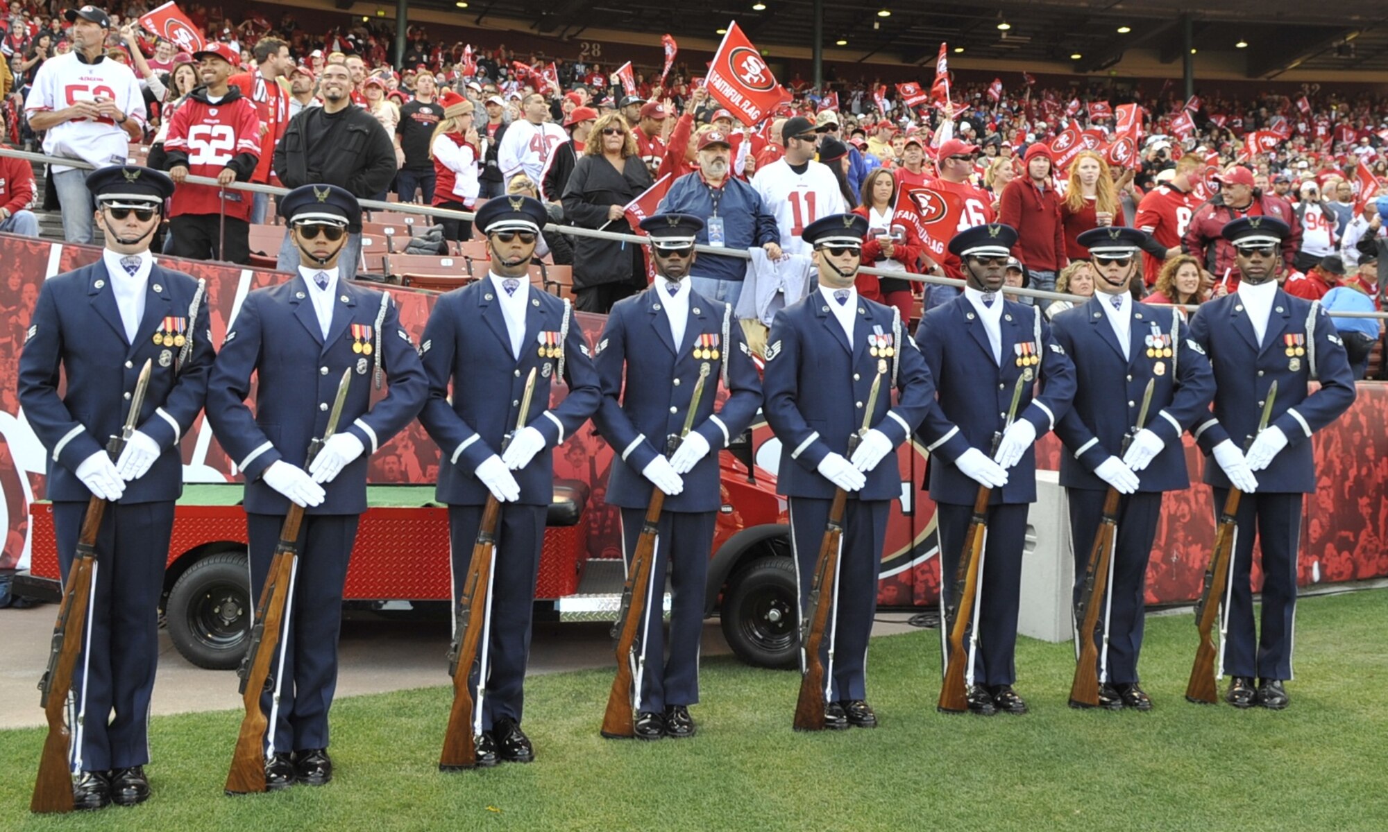 U.S. Air Force Honor Guard Drill Team members stand on the field at the Detroit Lions vs. San Francisco 49ers NFL football game at Candlestick Park in San Francisco, Calif., Sept. 16, 2012.  The Drill Team performed in front of more than 500 people during a pre-game drill and stood on the field during the National Anthem in front of a sold-out crowd.  (U.S. Air Force photo by Senior Master Sgt. Adam M. Stump)
