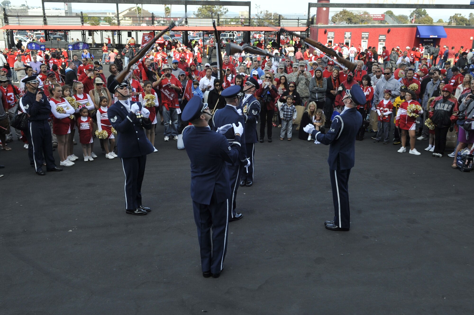 U.S. Air Force Honor Guard Drill Team members conduct a pre-game performance at the Detroit Lions vs. San Francisco 49ers NFL football game at Candlestick Park in San Francisco, Calif., Sept. 16, 2012.  The Drill Team performed in front of more than 500 people before the game and stood on the field during the National Anthem in front of a sold-out crowd.  (U.S. Air Force photo by Senior Master Sgt. Adam M. Stump)