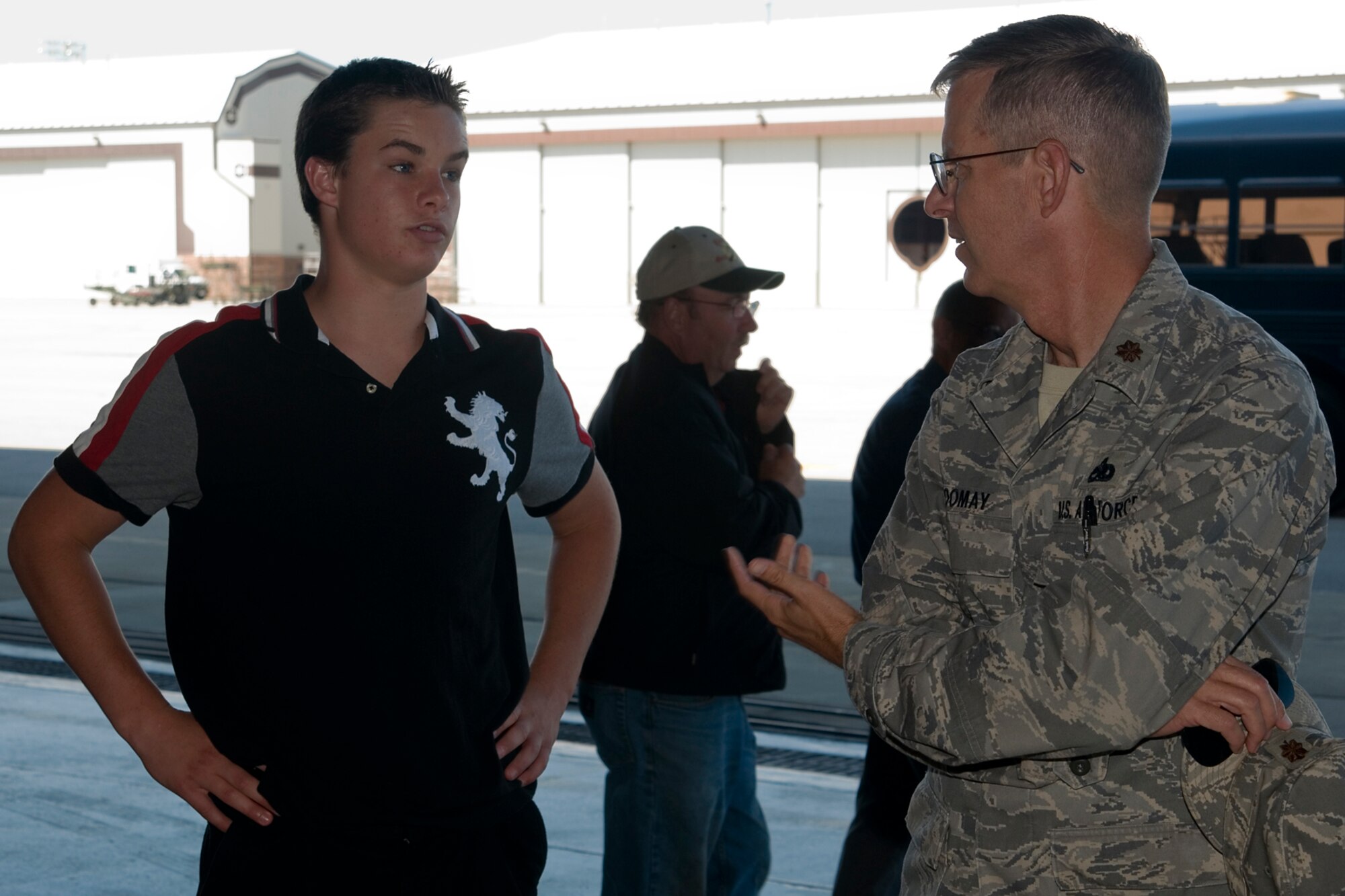 GRISSOM AIR RESERVE BASE, Ind. -- Maj. Shane Toomay, 434th Maintenance Squadron maintenance officer, talks with a student from Anderson High School, Anderson, Ind., outside of a KC-135R Stratotanker during a tour here Aug. 22. Navy Junior ROTC students from Anderson visited the base to learn more about the military and the 434th Air Refueling Wing. (U.S. Air Force photo/Senior Airman Andrew McLaughlin)
