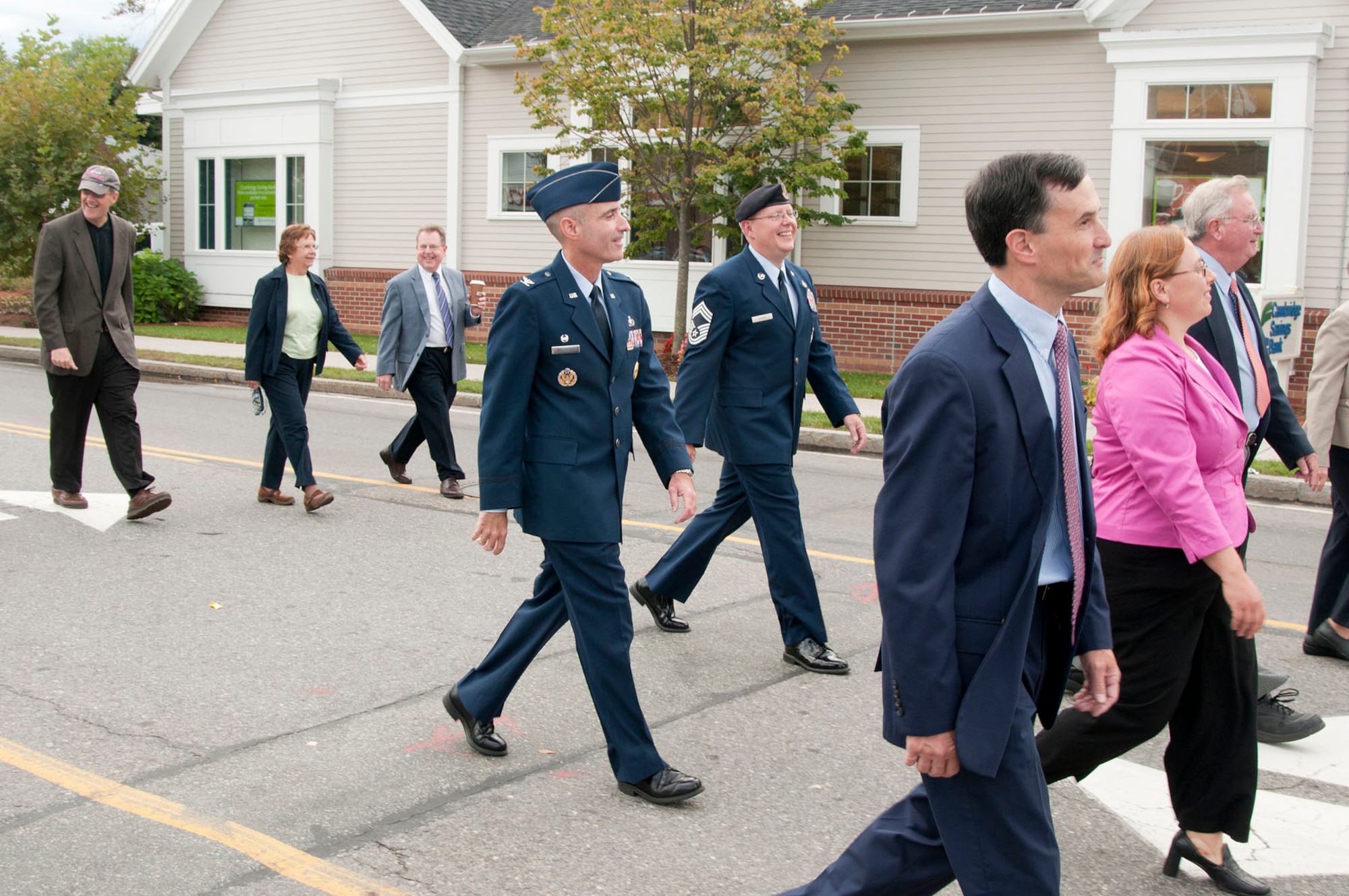 HANSCOM AIR FORCE BASE, Mass. - Col. Lester A. Weilacher, 66th Air Base Group commander, and Chief Master Sgt. David Huerd, 66th Security Forces Squadron manager, march in the Bedford Day parade with other Bedford community leaders Sept. 15. The parade celebrated the 283rd anniversary of the town’s incorporation. (U.S. Air Force photo by Mark Wyatt)