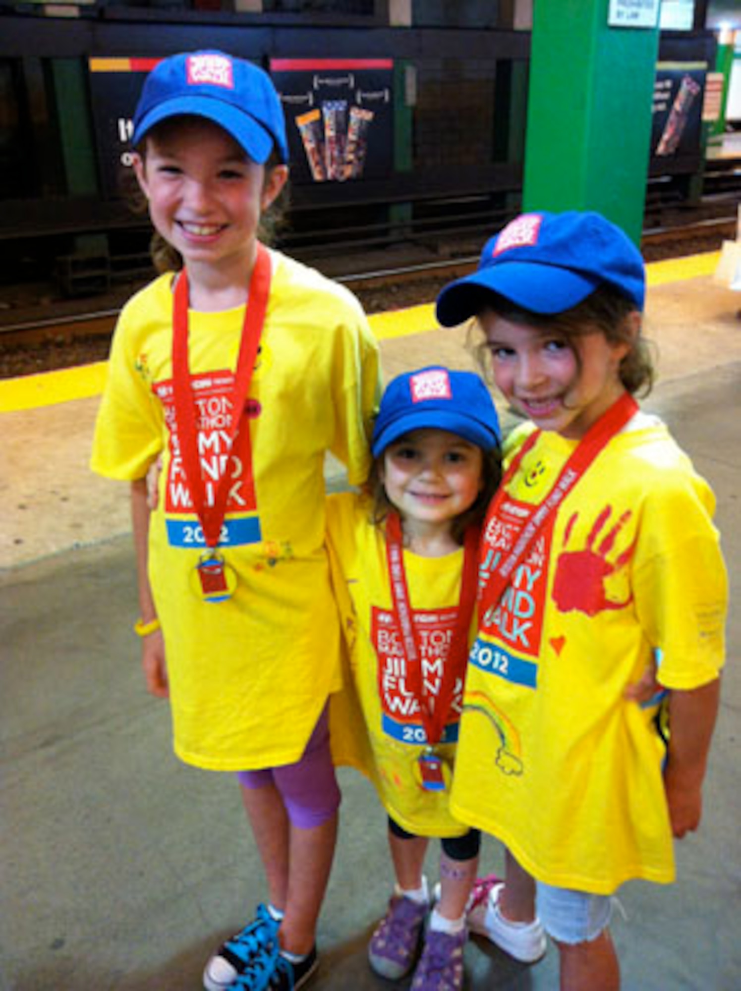 Boston - (from left to right) Jessica, Mackenzie and Amy Albert pose after walking three miles at the Jimmy Fund Walk in Boston Sep. 9. More than 7,500 walkers participated in the event that supports the fight against cancer in children and adults at Boston’s Dana-Farber Cancer Institute. (Courtesy photo)