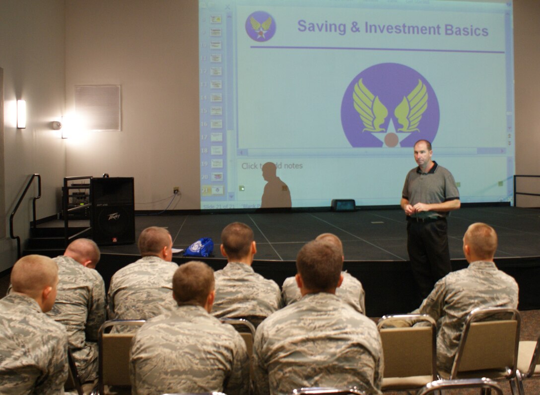Mike Brown, Airman & Family Readiness Center instructor, talks with recent technical training graduates about money saving topics at the Solid Rock Cafe on Sep. 19, 2012, at Sheppard Air Force Base, Texas.  The training was conducted as part of a test program on how to maximize students time who are "out of training" for various reasons.  (U.S. Air Force photo/Dan Hawkins)