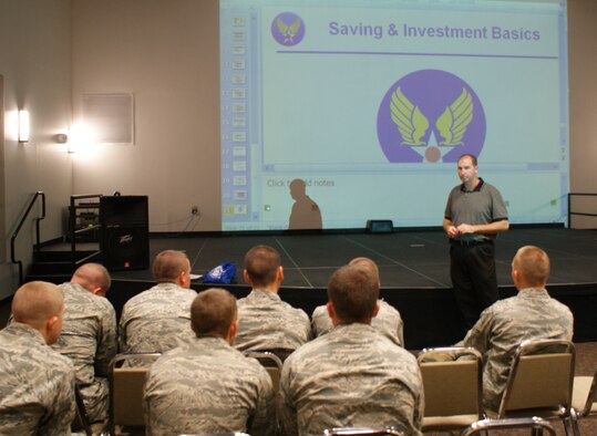Mike Brown, Airman & Family Readiness Center instructor, talks with recent technical training graduates about money saving topics at the Solid Rock Cafe on Sep. 19, 2012, at Sheppard Air Force Base, Texas.  The training was conducted as part of a test program on how to maximize students time who are "out of training" for various reasons.  (U.S. Air Force photo/Dan Hawkins)