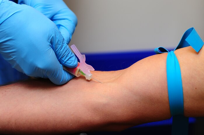 Senior Airman Eathain Duwe, 628th Medical Group medical laboratory technician, draws blood from a patient Sept. 11, 2012, at the 628th MDG laboratory at Joint Base Charleston - Air Base, S.C. The 628th MG Laboratory conducts all clinical laboratory procedures required in support of the 628th MDG’s mission. (U.S. Air Force photo/ Airman 1st Class Chacarra Walker)