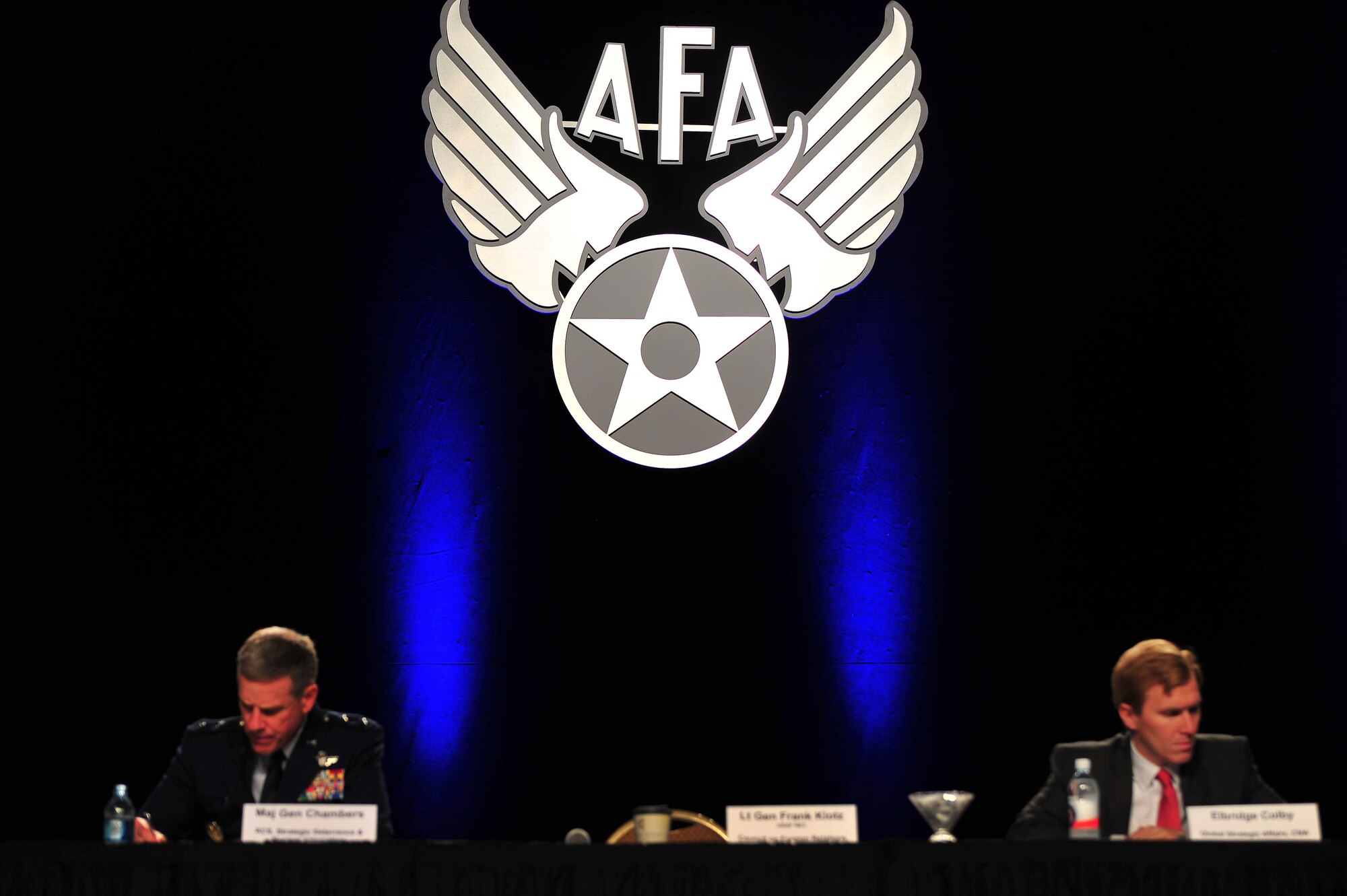 Maj. Gen. William A. Chambers, Strategic Deterrence and Nuclear Integration assistant chief of staff,  and Elbridge Colby, Global Strategic Affairs Center for Analyses principal analist and division lead, review notes during a panel discussion on the role of the Intercontinental Ballistic Missle force in the 21st Century Deterrence at the Air Force Association Air and Space conference Sept. 18 in Washington, D.C. ICBM force attributes were compared and discussed in light of ongoing debates concerning U.S. nuclear force structure. (U.S. Air Force photo by Senior Airman Steele C. G. Britton)