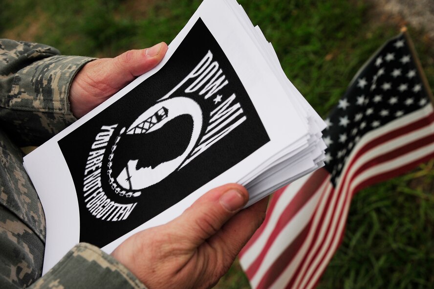 Flyers are brought to the prisoner of war and missing-in-action run opening ceremony at Whiteman Air Force Base, Mo., Sept. 13. The POW/MIA run was to show respect to those who have sacrificed for their country and for their family members who are left behind. The run's goal is to remind all that we will not forget. (U.S. Air Force photo/ Senior Airman Cody H. Ramirez)