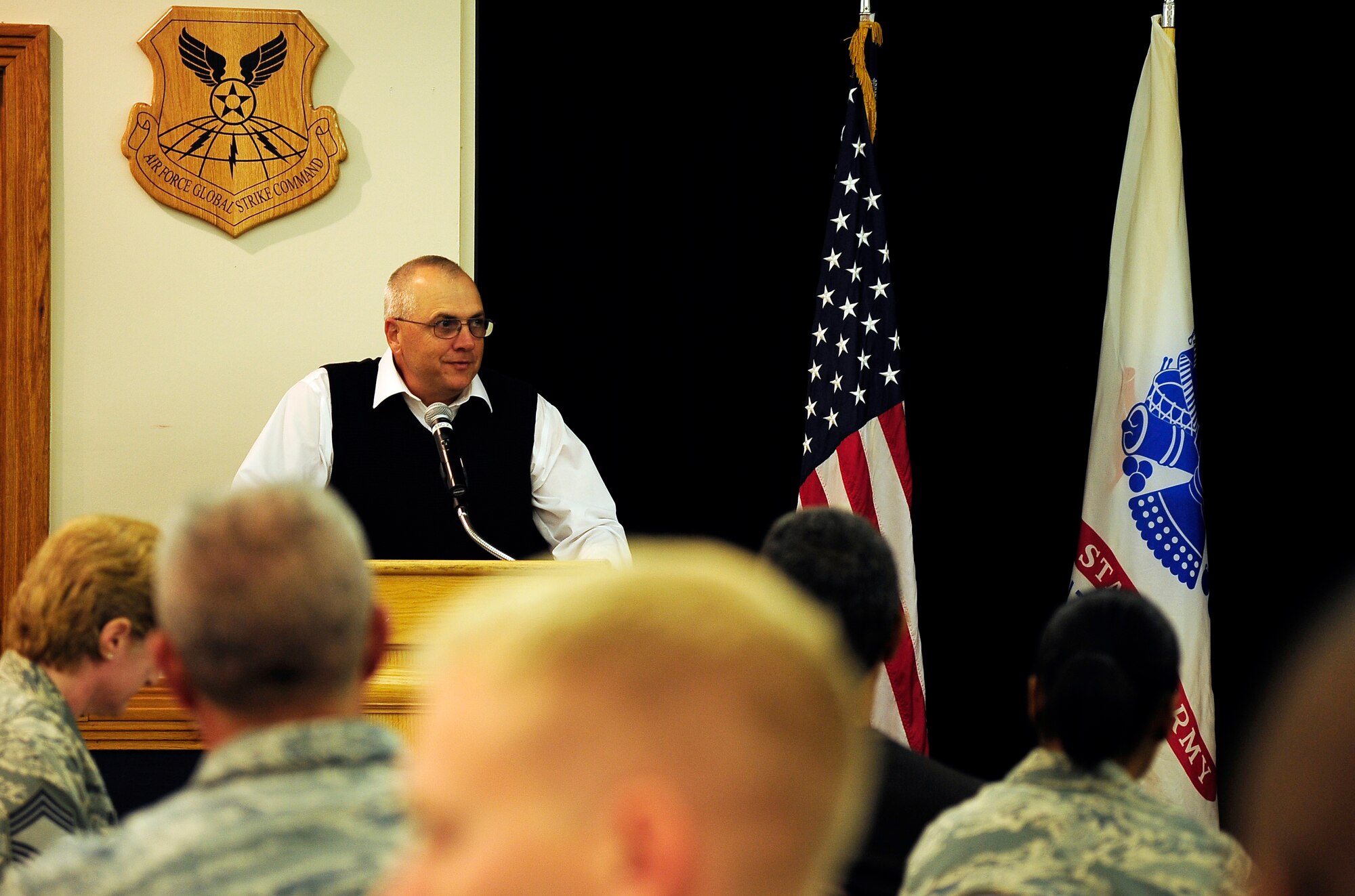 Mark Clark, retired Air Force chief master sergeant, speaks during a prisoner of war and missing-in-action breakfast at Whiteman Air Force Base, Mo., Sept. 14. The POW/MIA breakfast showed respect and support to those who have sacrificed for our country and the families they may have left behind. (U.S. Air Force photo/ Senior Airman Cody H. Ramirez)(RELEASED)